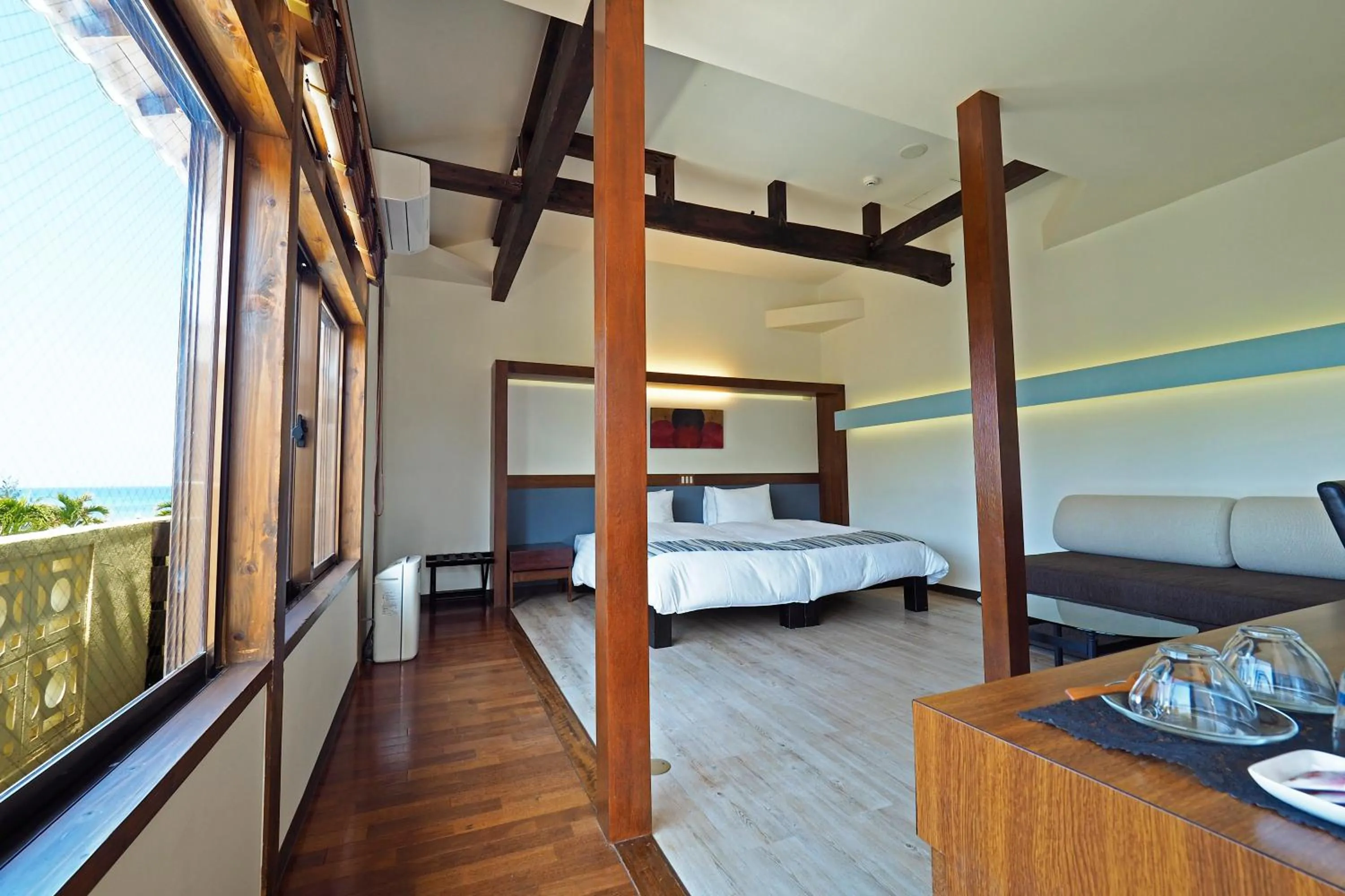 Bed in La Casa Panacea Okinawa Resort