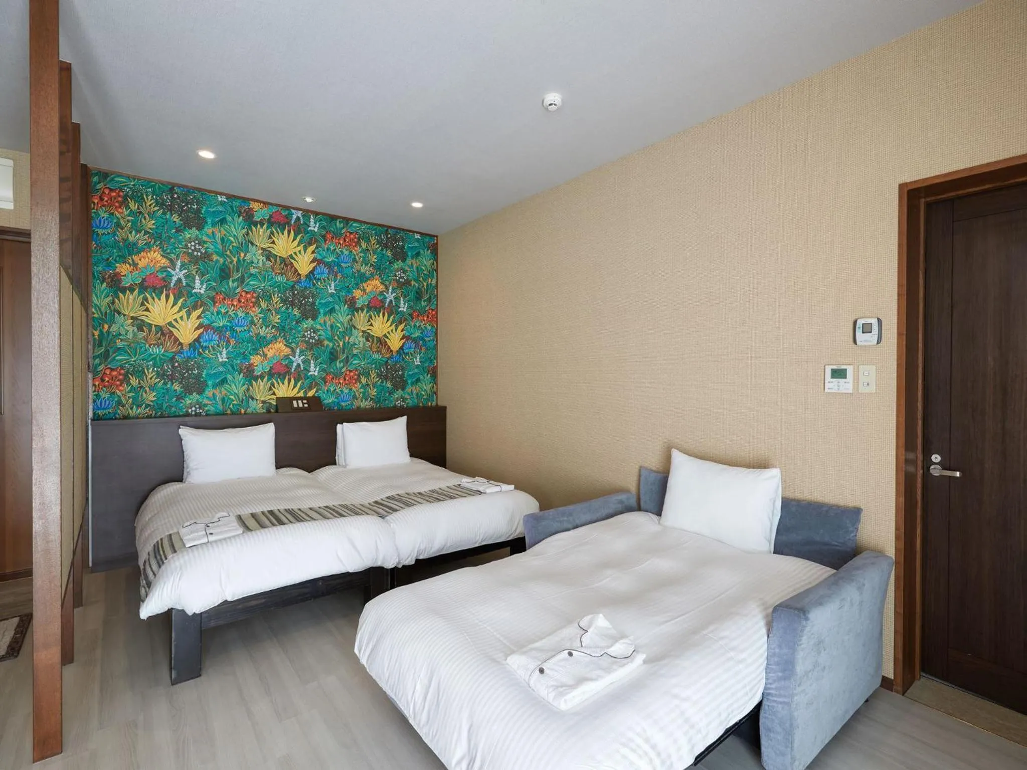 Photo of the whole room, Bed in La Casa Panacea Okinawa Resort