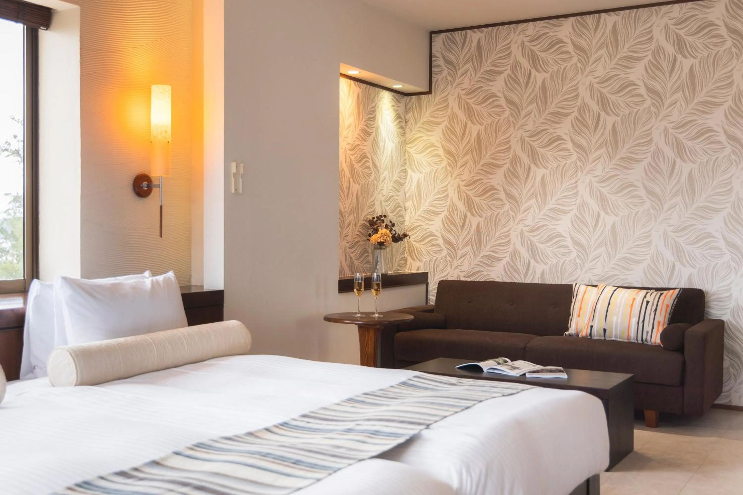 Bed in La Casa Panacea Okinawa Resort