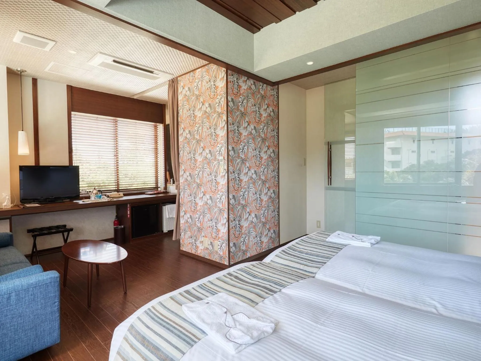 Photo of the whole room, Bed in La Casa Panacea Okinawa Resort