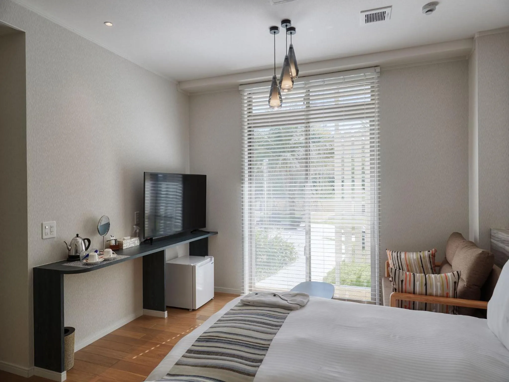 Photo of the whole room, Bed in La Casa Panacea Okinawa Resort