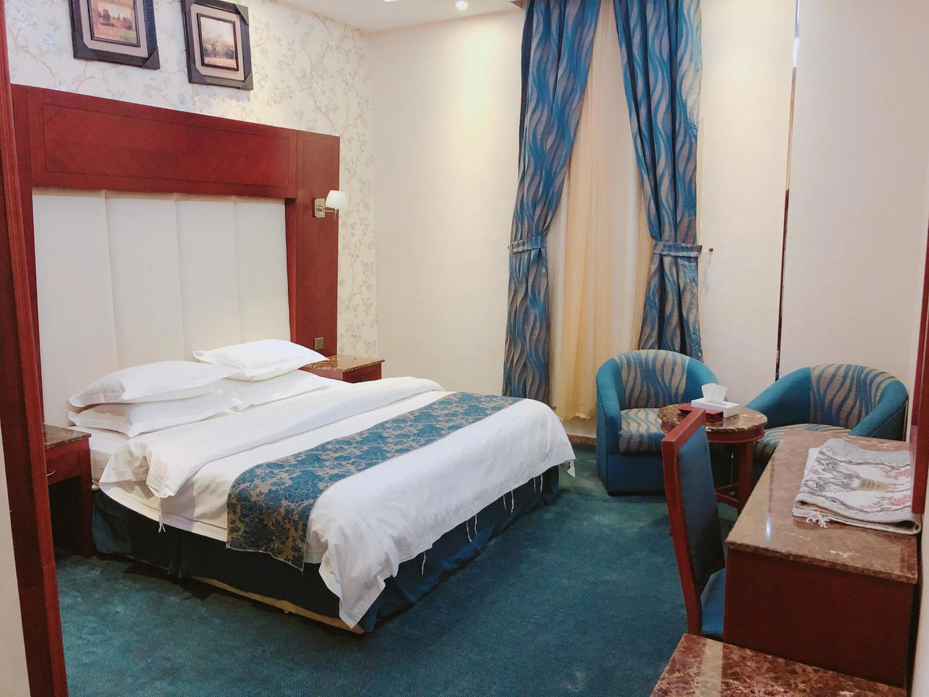 Bed in Elaf Suites Al Hamra