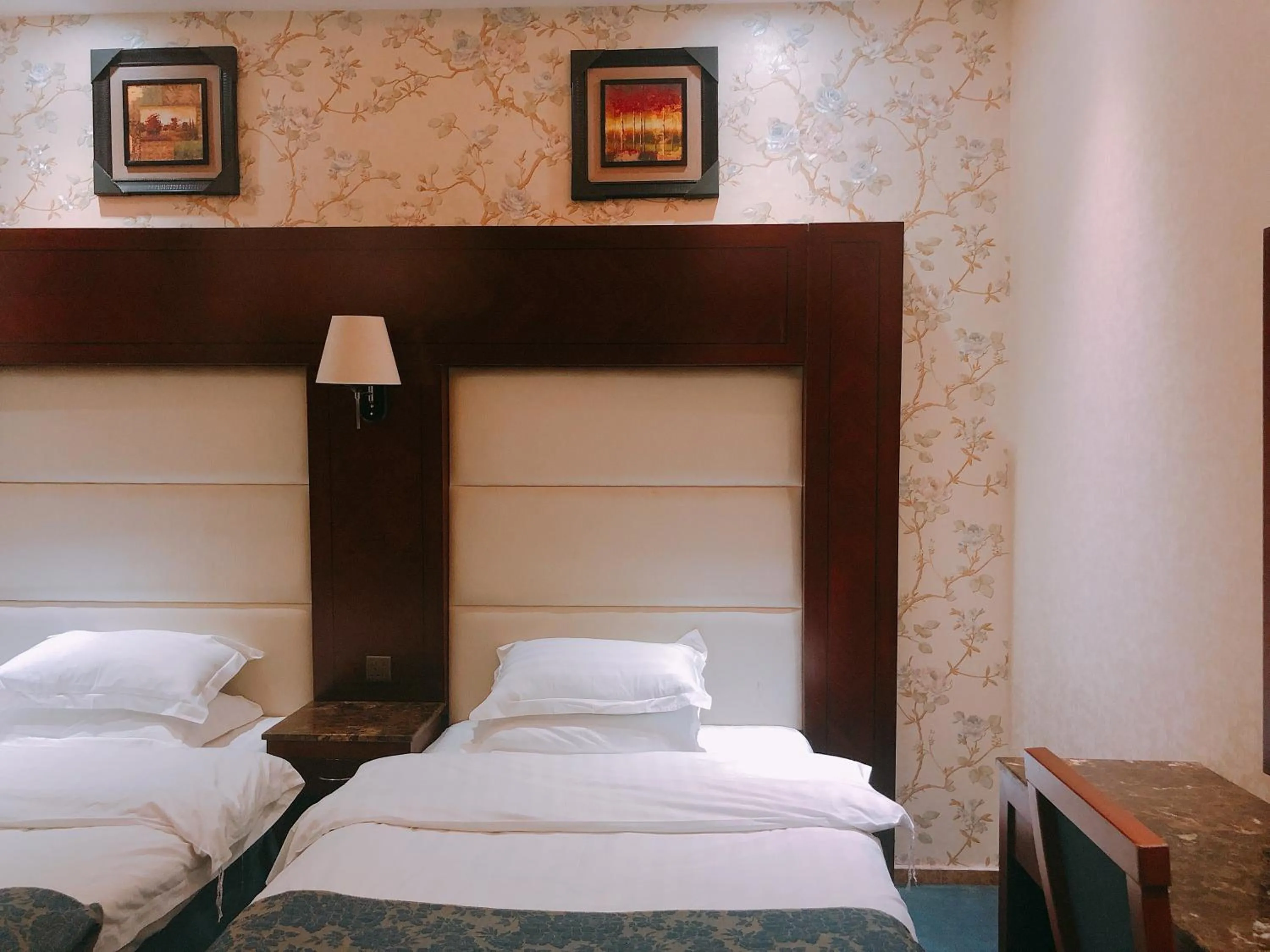 Bed in Elaf Suites Al Hamra