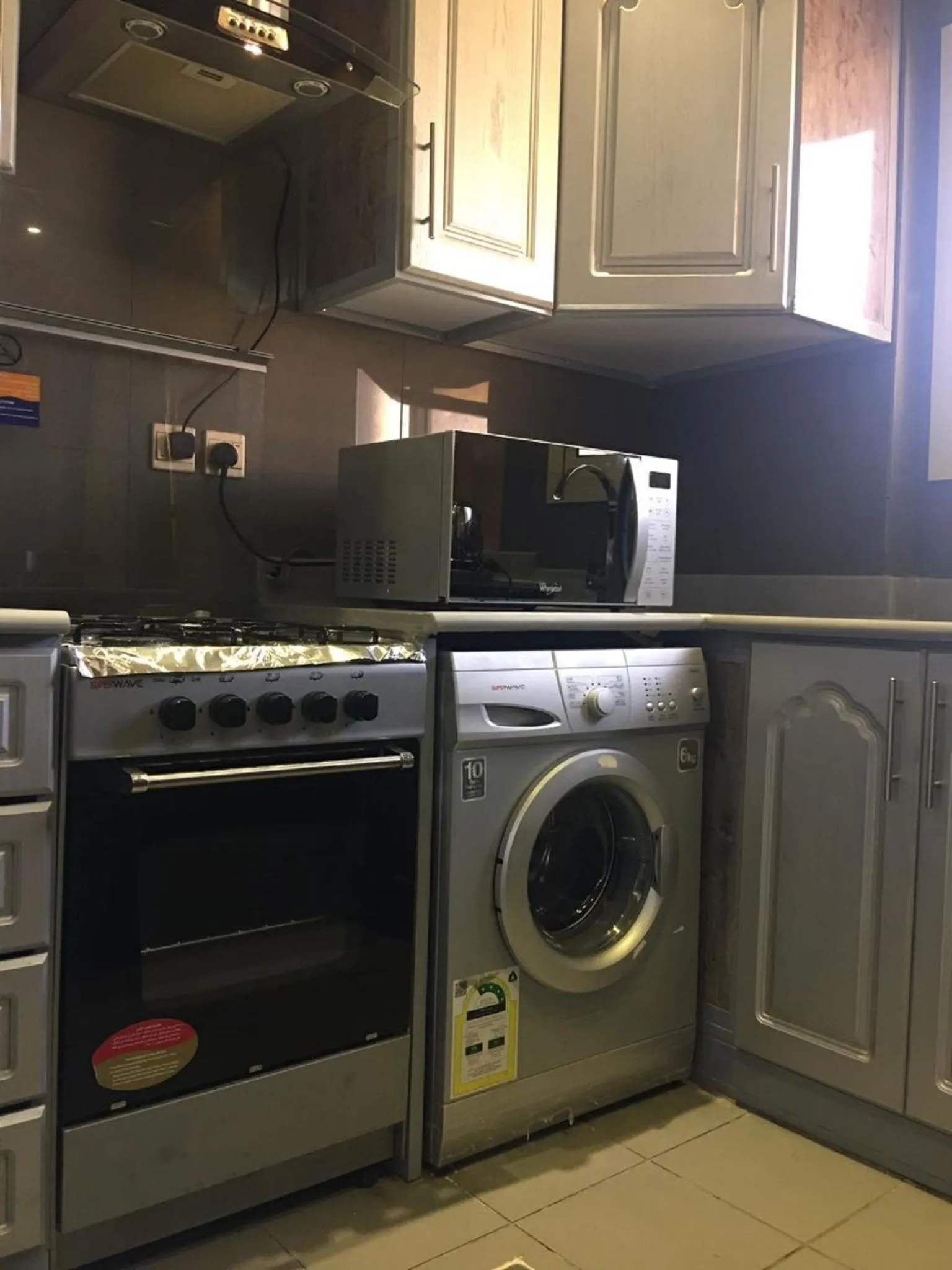 Kitchen or kitchenette in Elaf Suites Al Hamra