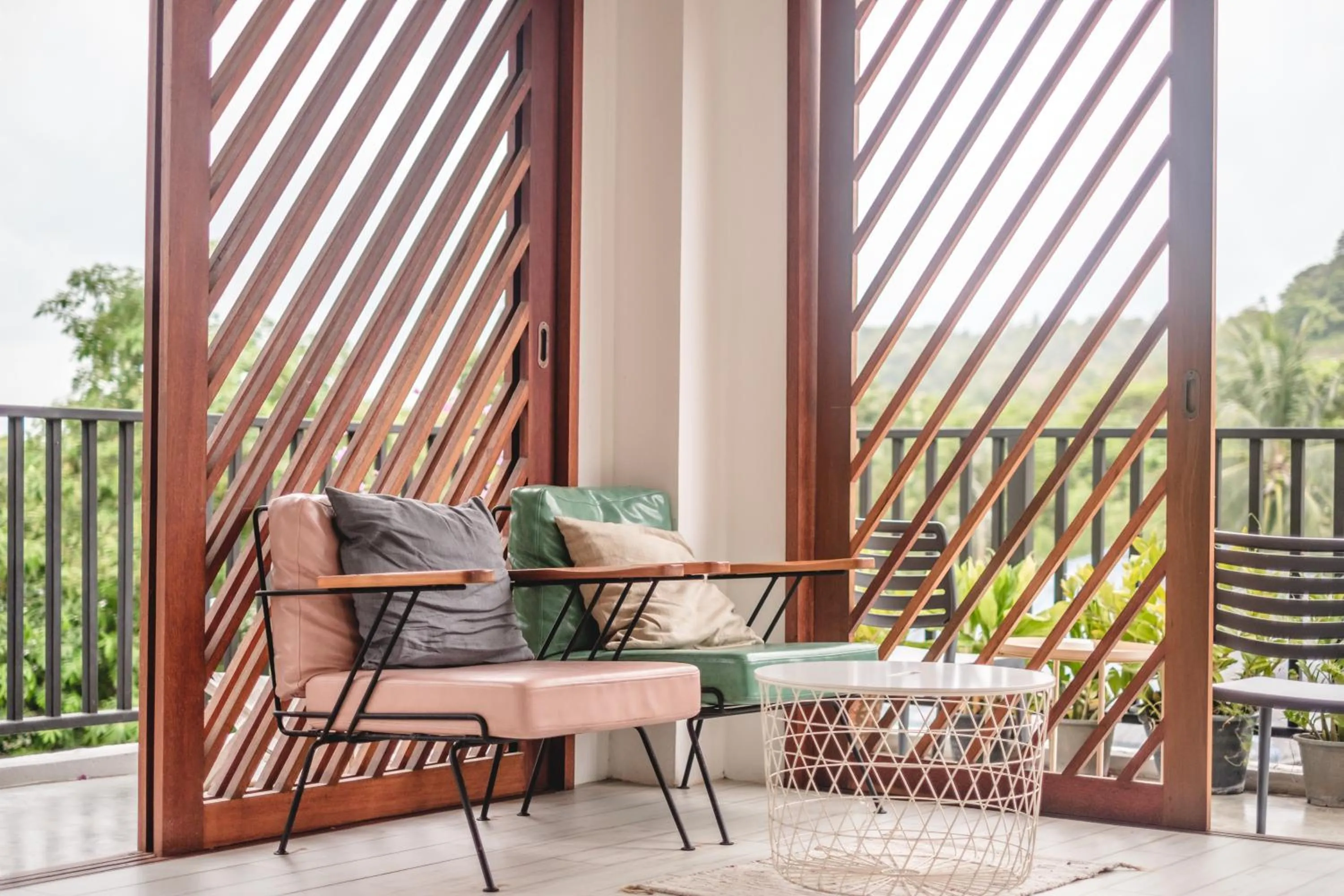 Communal lounge/ TV room in The Dearly Koh Tao Hostel-PADI 5 Star Dive Resort