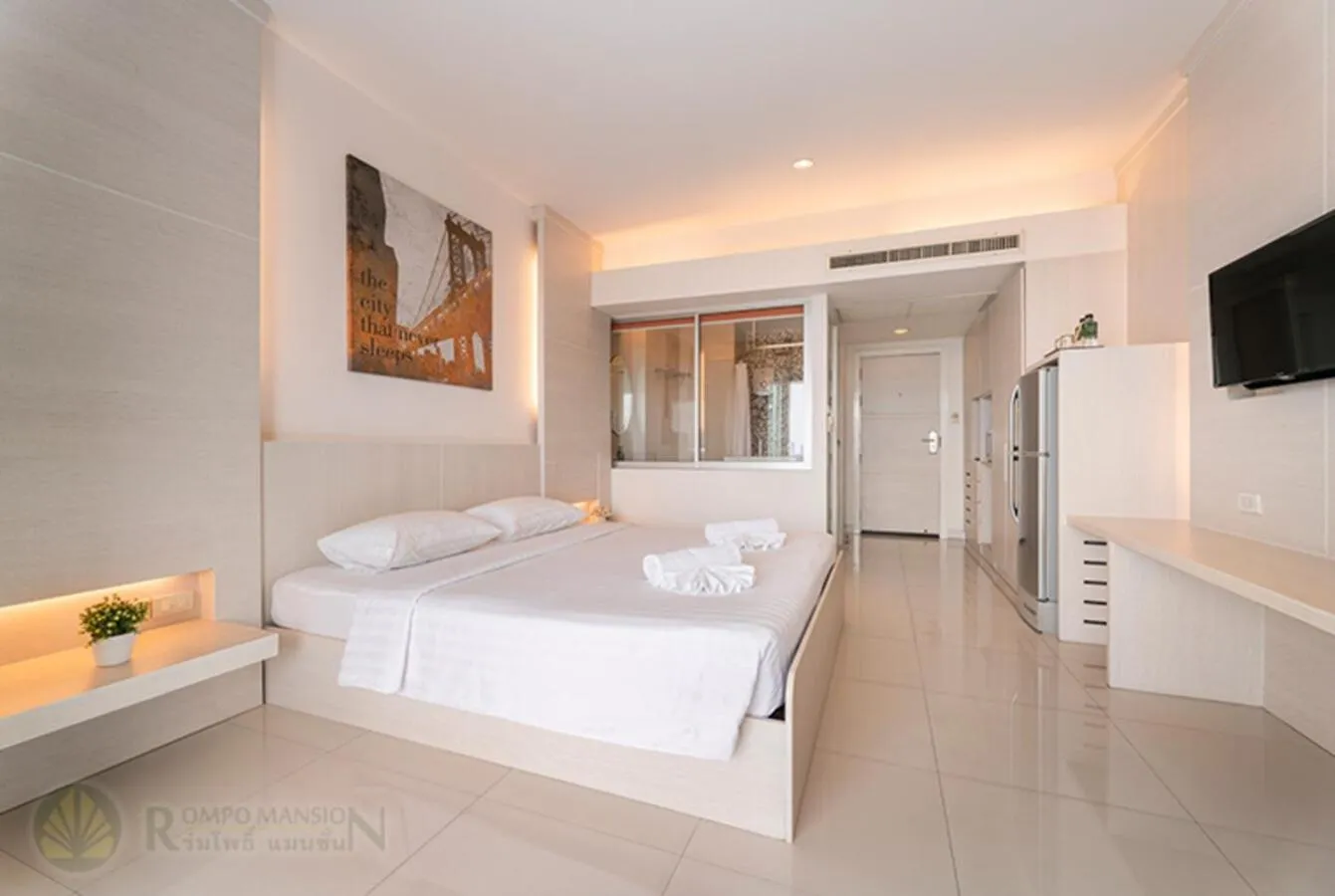 Bed in At 115 Hotel By Rompo