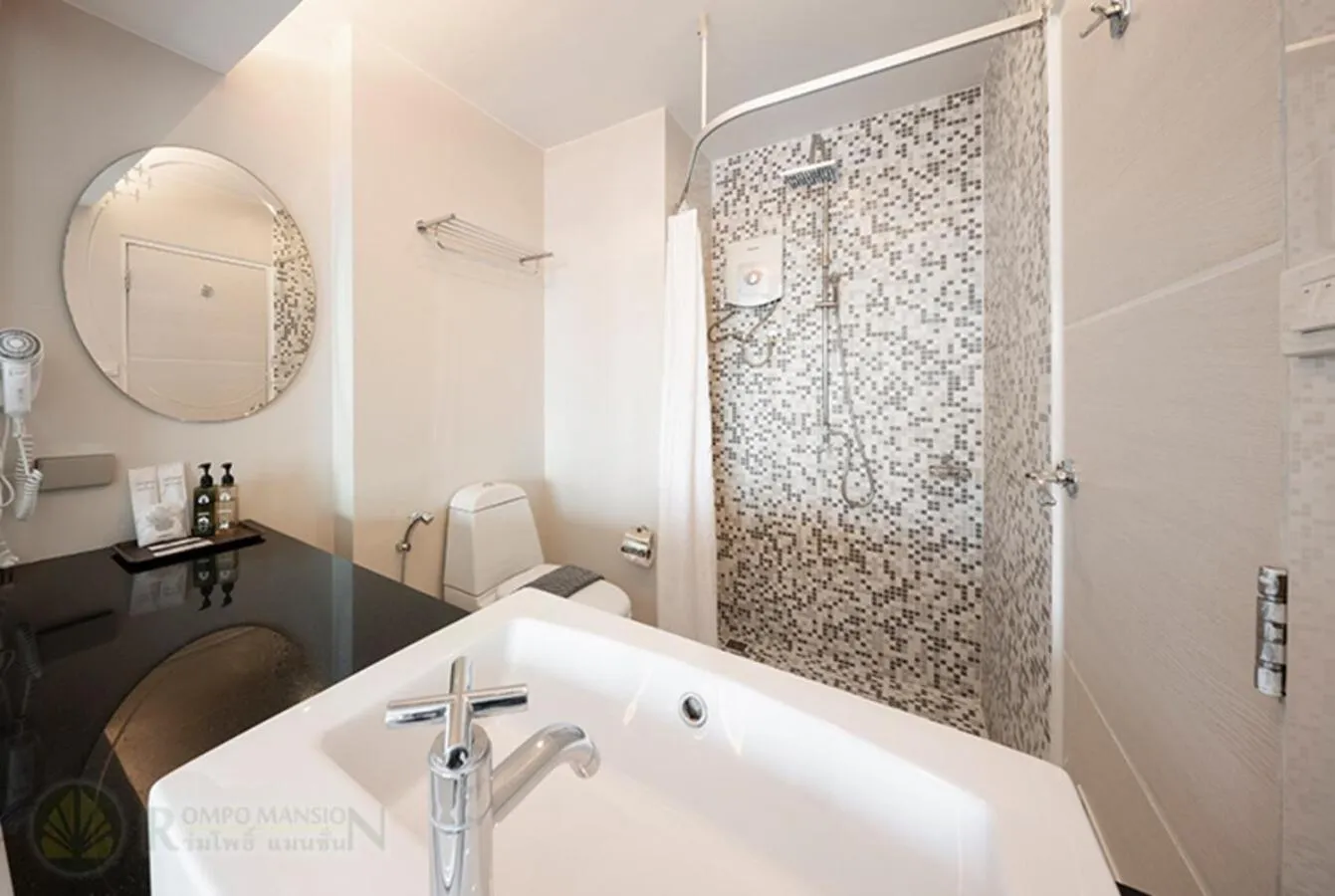 Bathroom in At 115 Hotel By Rompo