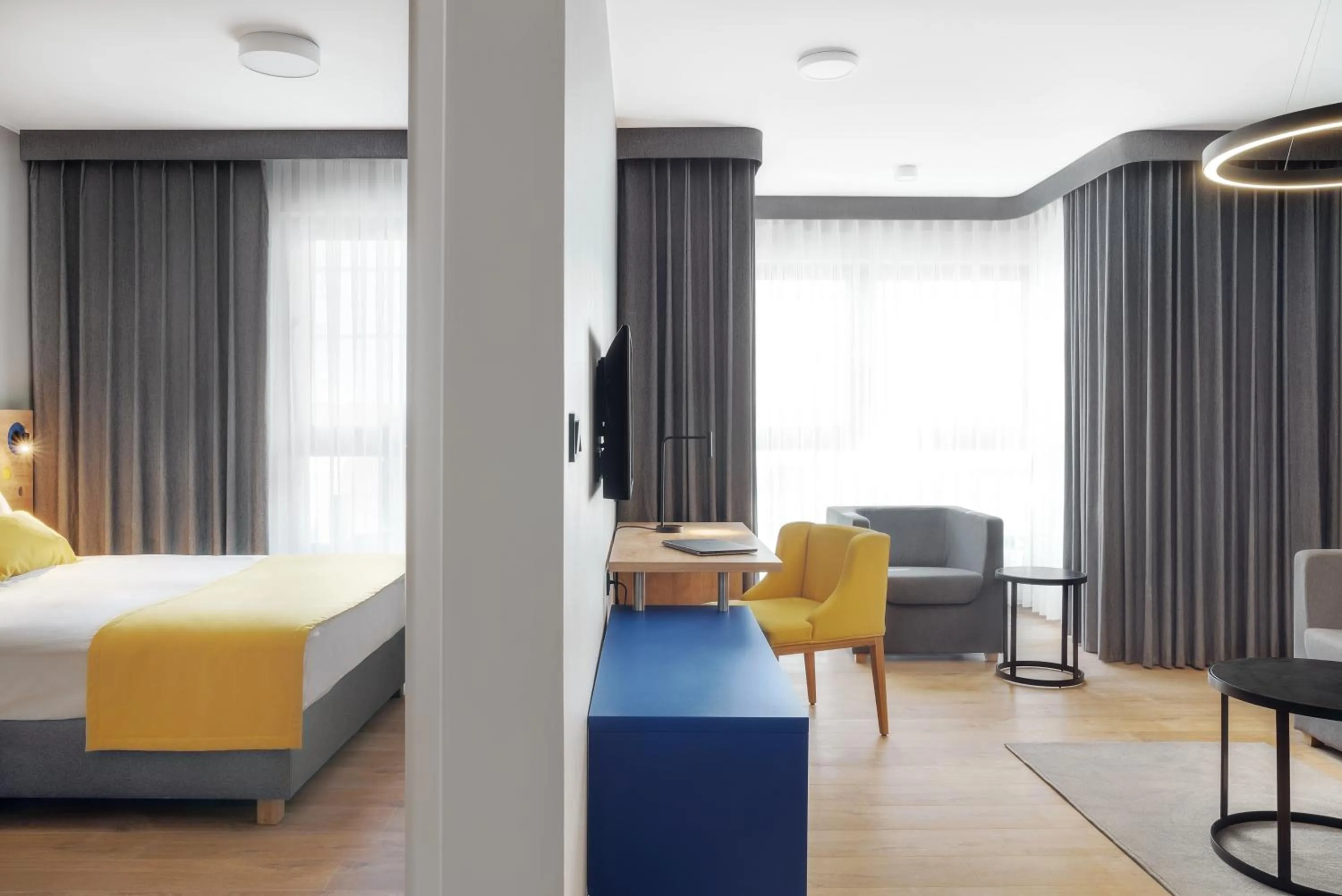 Living room, Bed in GRANO LIFE Gdańsk - HOTEL NUMBER ONE BY GRANO Gdańsk