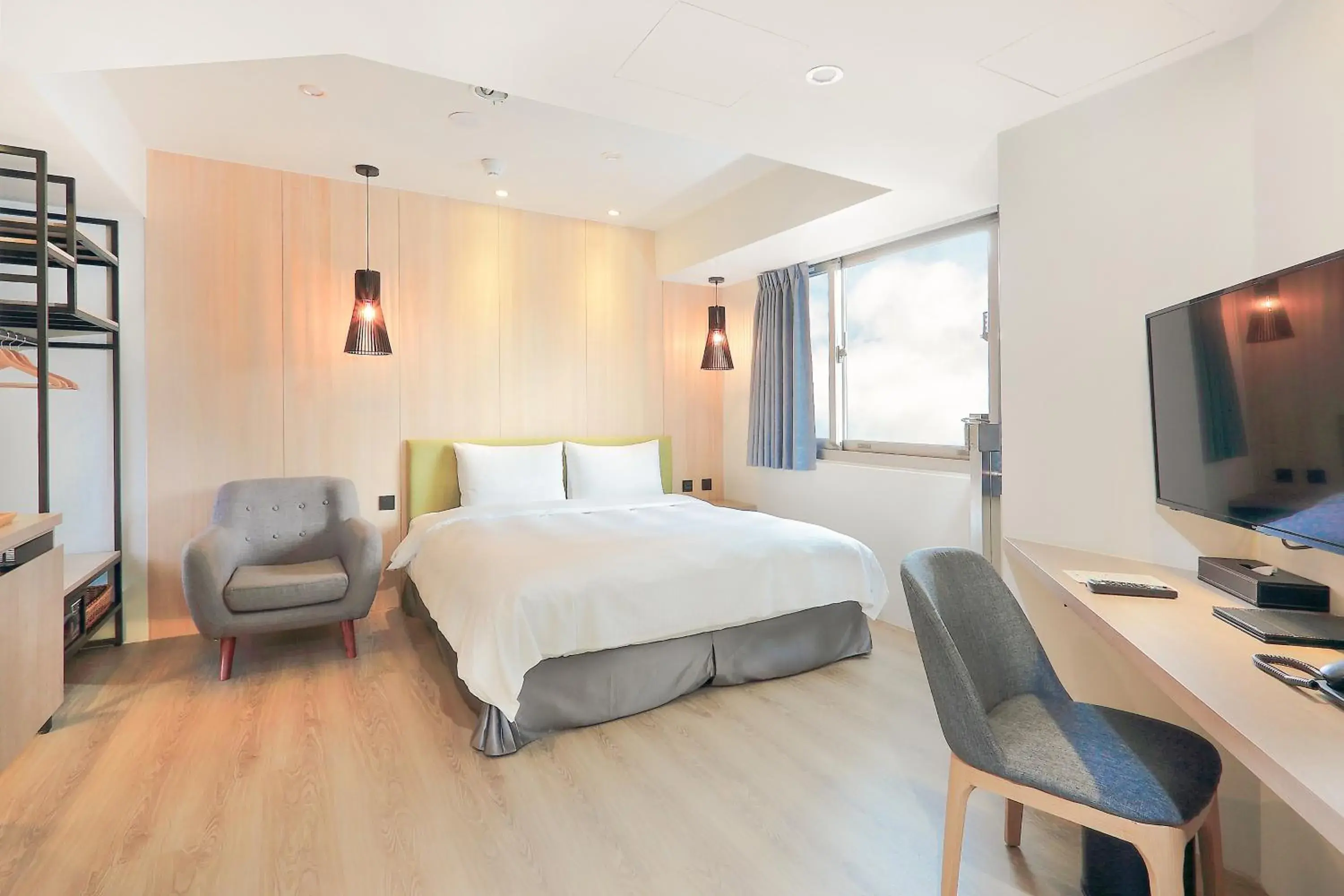 Photo of the whole room, Bed in Green Hotel - West District Photo of the whole room, Bed in Green Hotel - West District