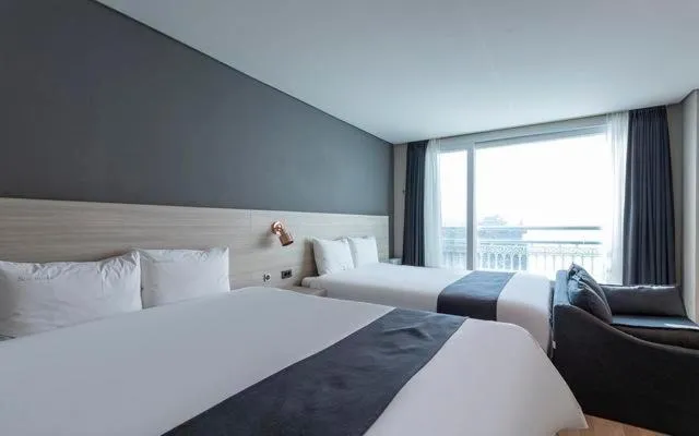 Bed in Gyeongpo Soo Hotel