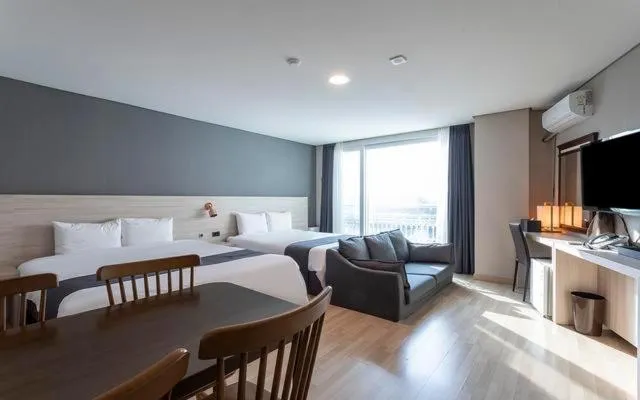 Bed in Gyeongpo Soo Hotel