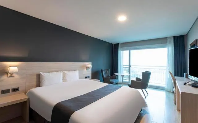 Bed in Gyeongpo Soo Hotel