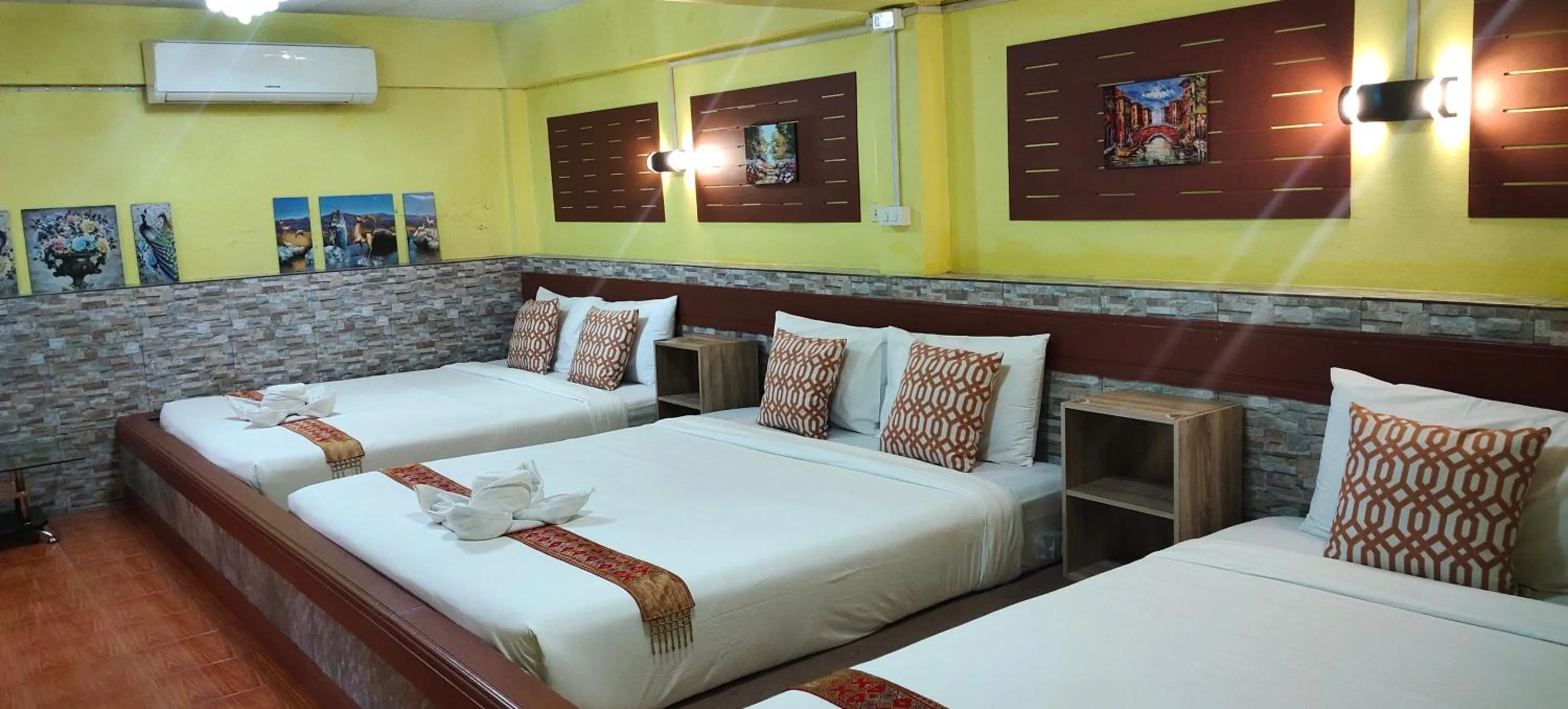 Bed in Baan Asree homestayบ้านอัสรี