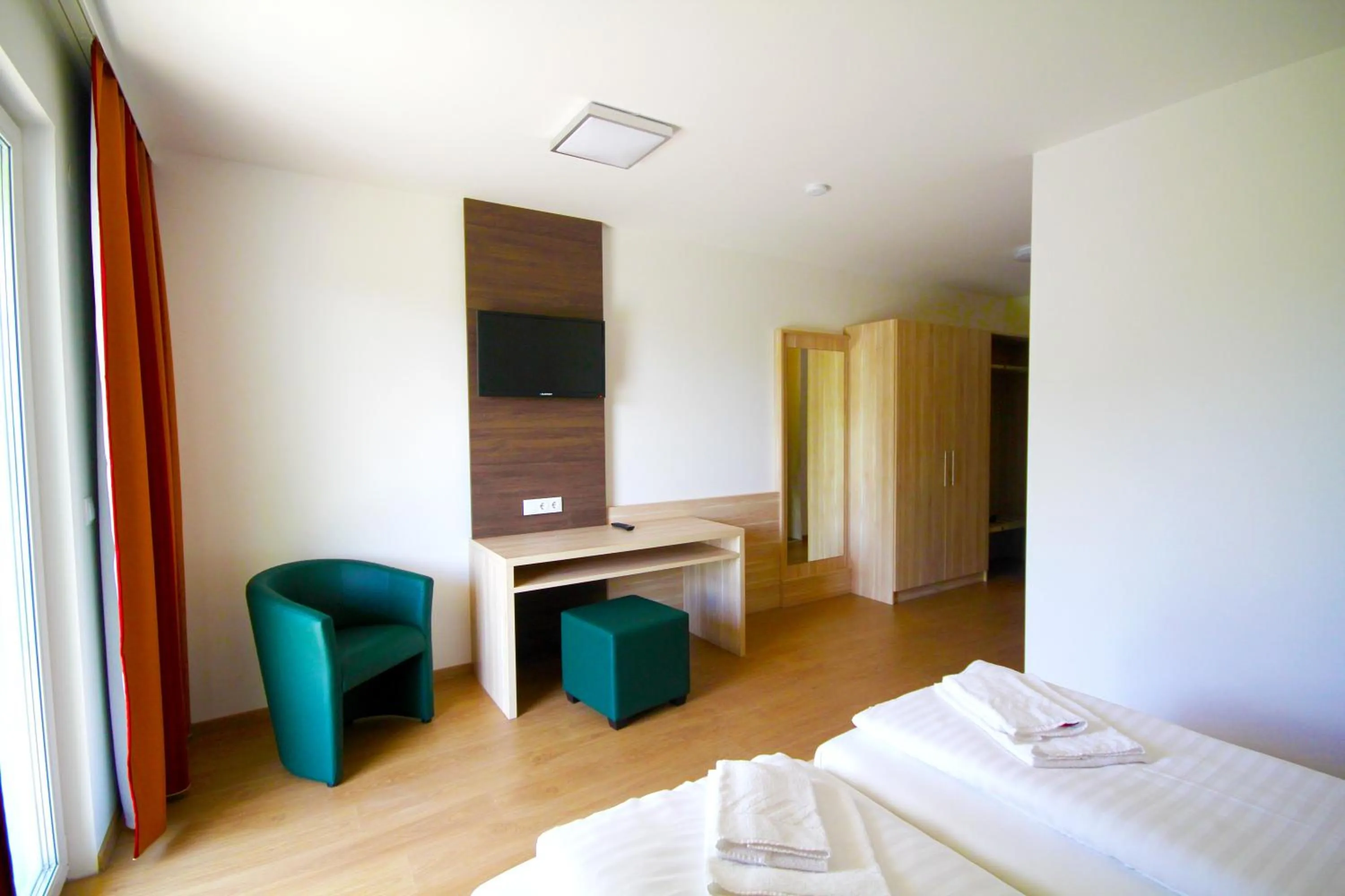 Photo of the whole room, Bed in Dorfgasthof Berlakovich