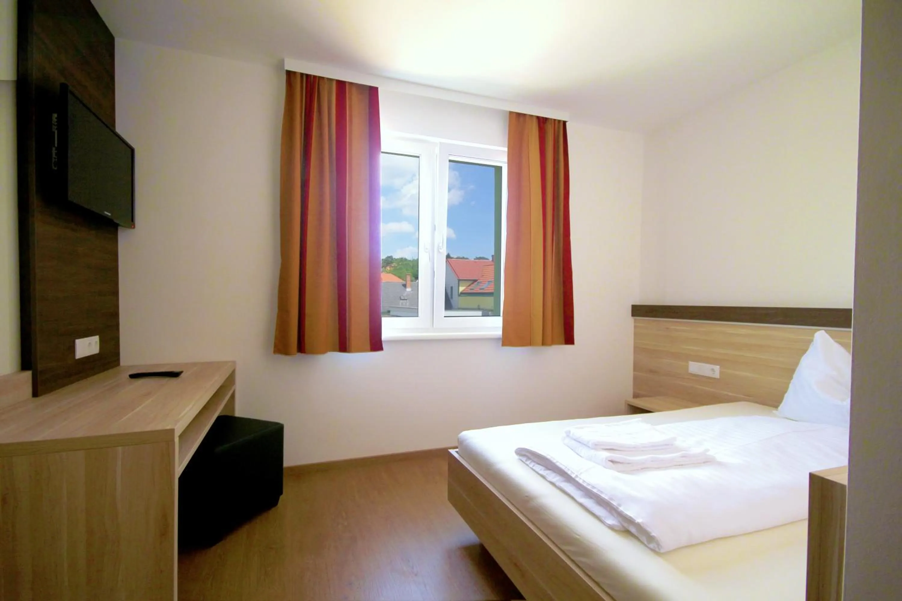 Photo of the whole room, Bed in Dorfgasthof Berlakovich