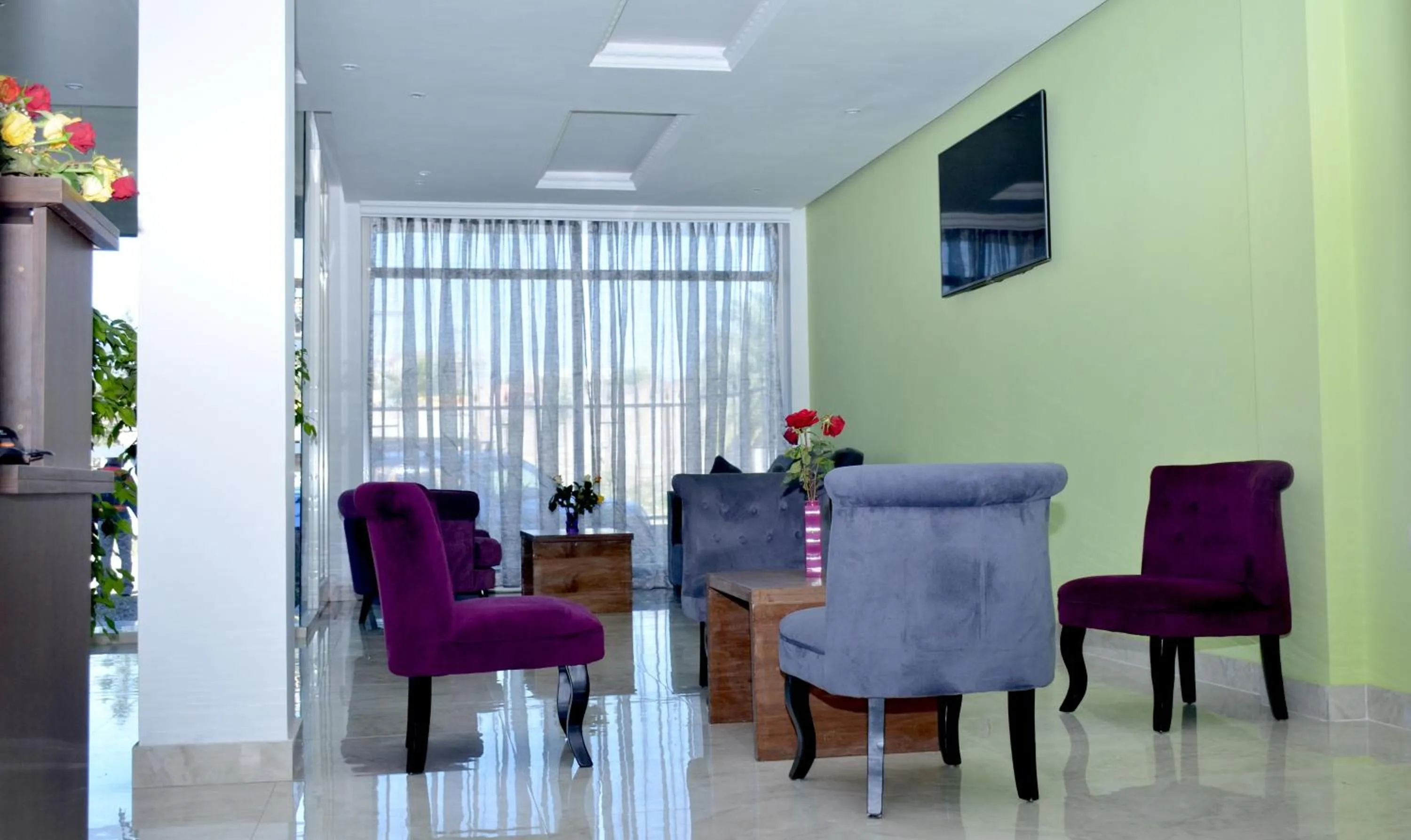 Communal lounge/ TV room in Melodie Hotel