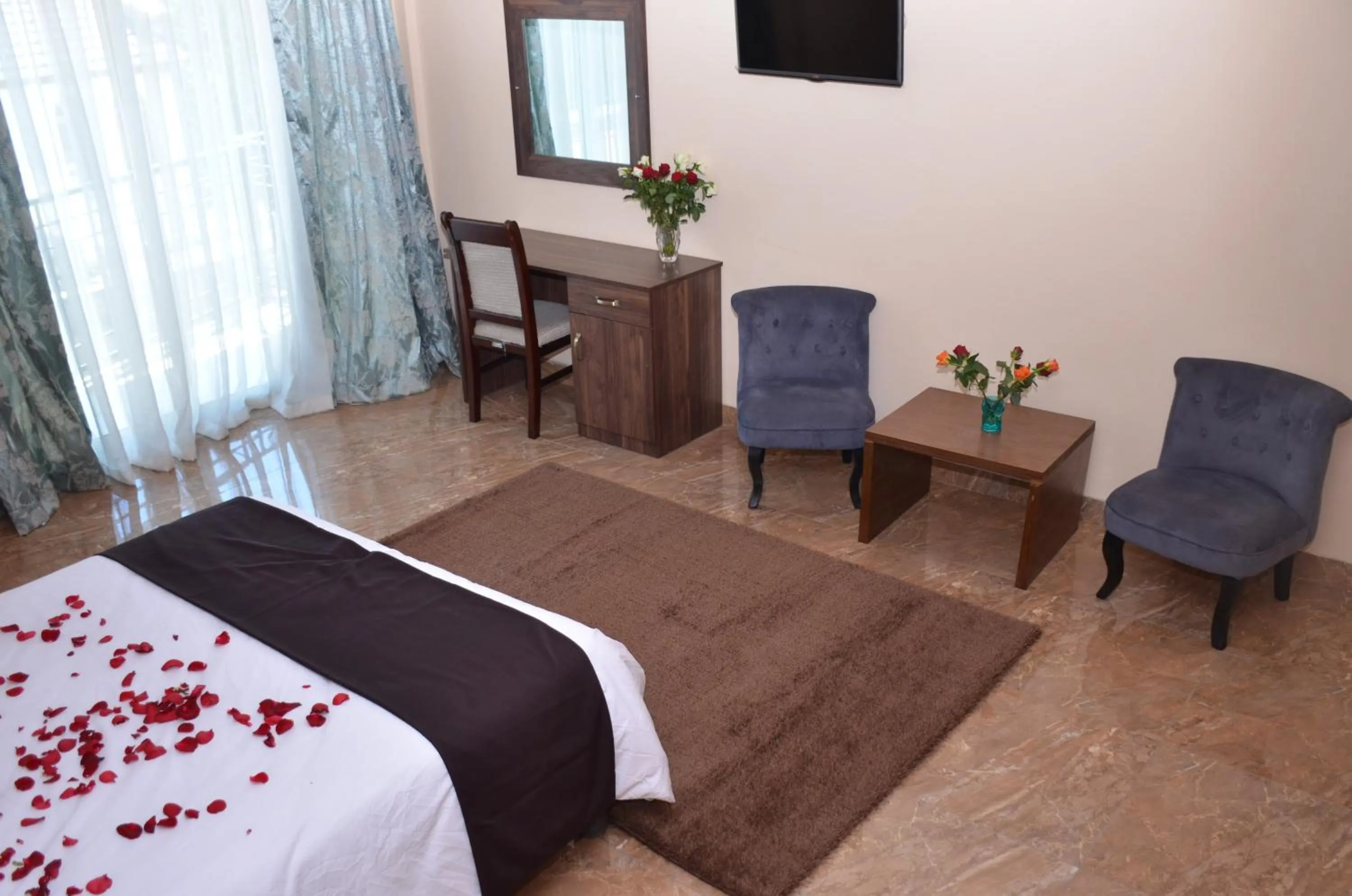 TV and multimedia, Bed in Melodie Hotel