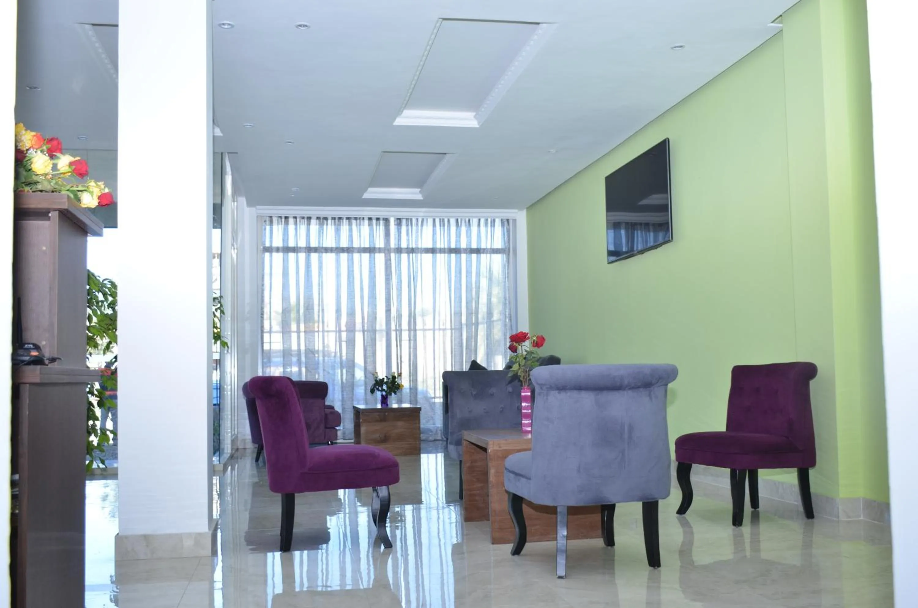 Communal lounge/ TV room in Melodie Hotel