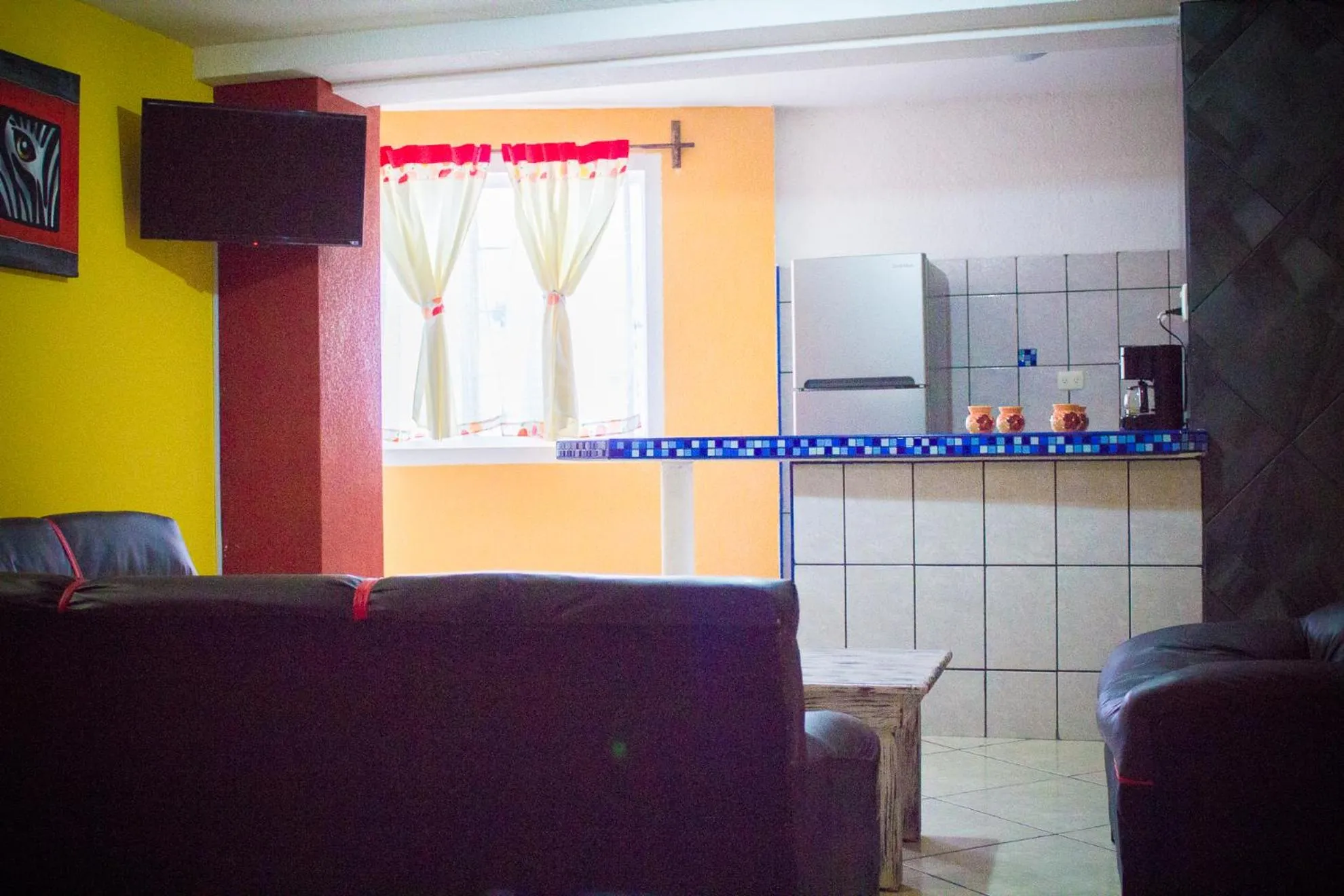 Kitchen or kitchenette in Hotel & Suites Cerro Roj0