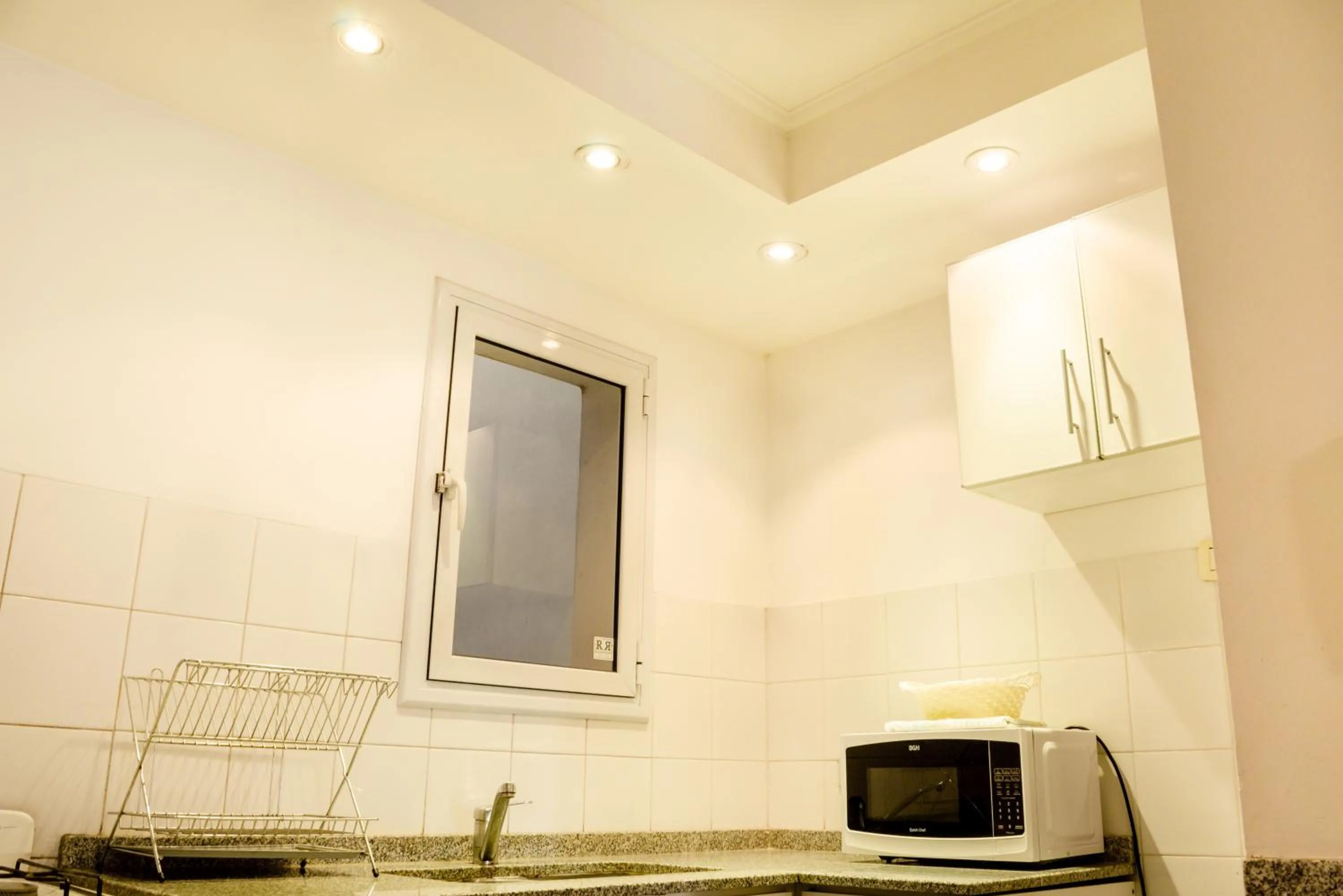 Kitchen or kitchenette in Lofty Departamentos Temporarios