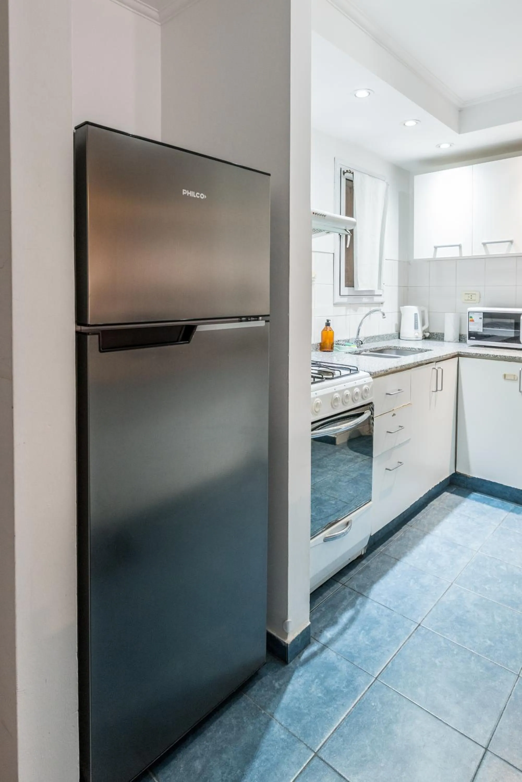 Kitchen or kitchenette in Lofty Departamentos Temporarios
