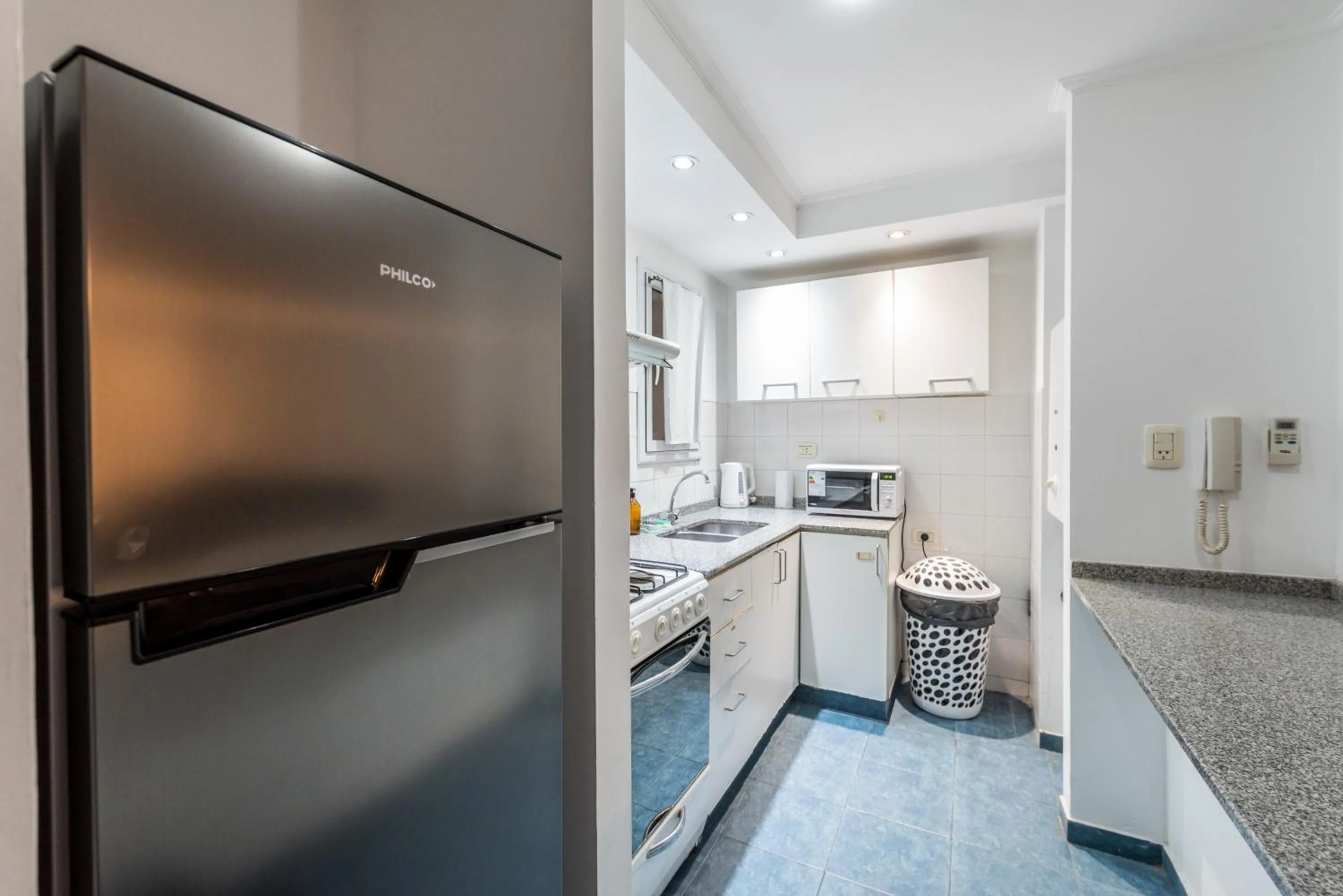 Kitchen or kitchenette in Lofty Departamentos Temporarios