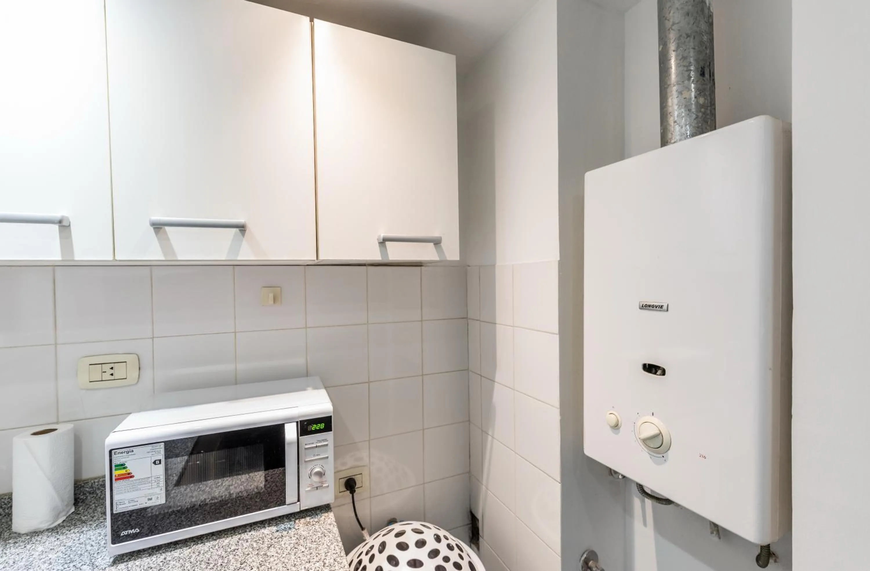 Kitchen or kitchenette in Lofty Departamentos Temporarios