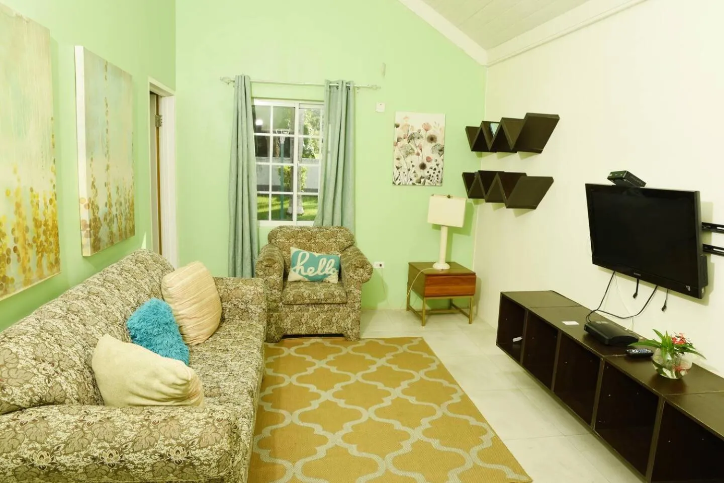 Communal lounge/ TV room in Seacastles by the beach/pool