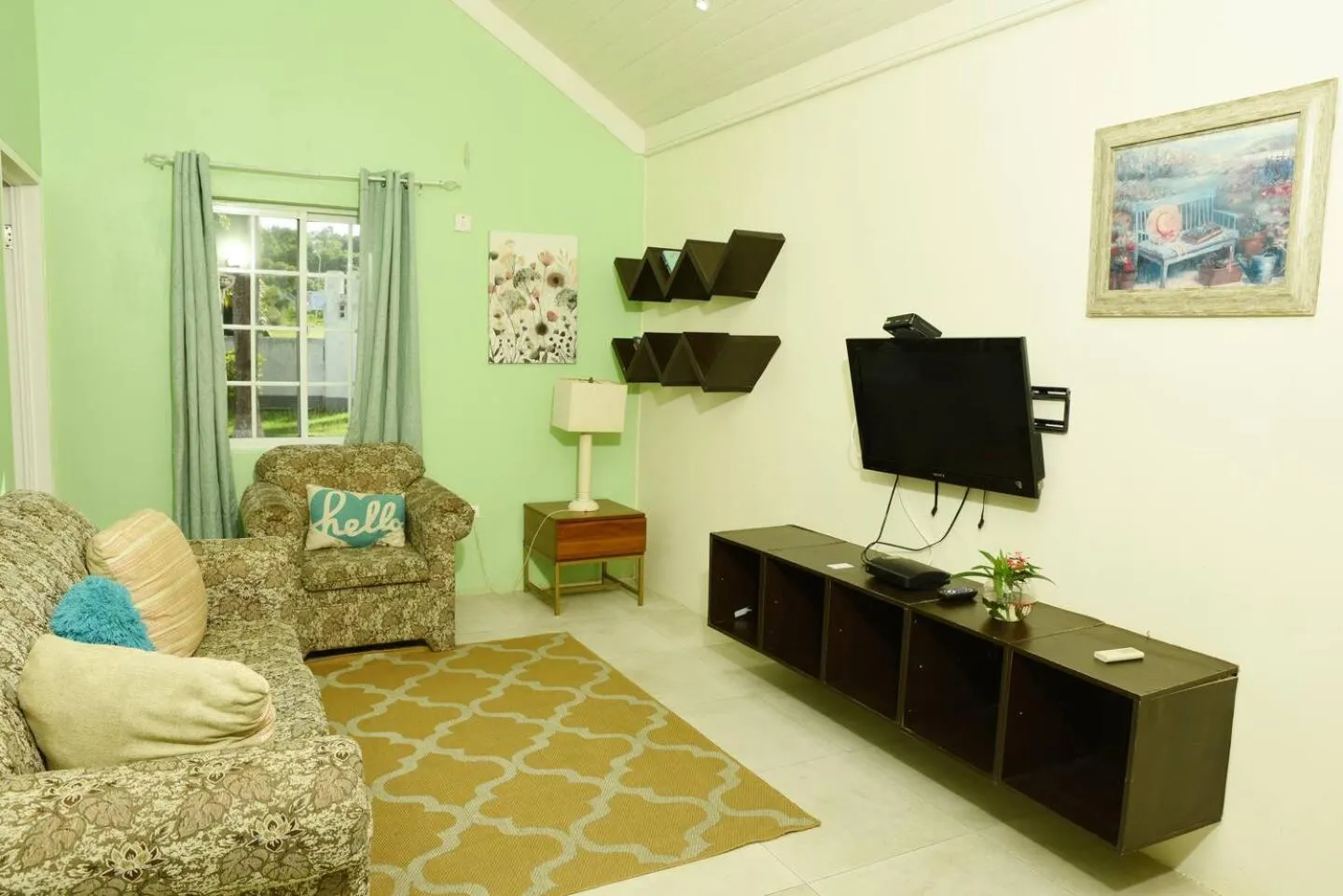 Communal lounge/ TV room in Seacastles by the beach/pool