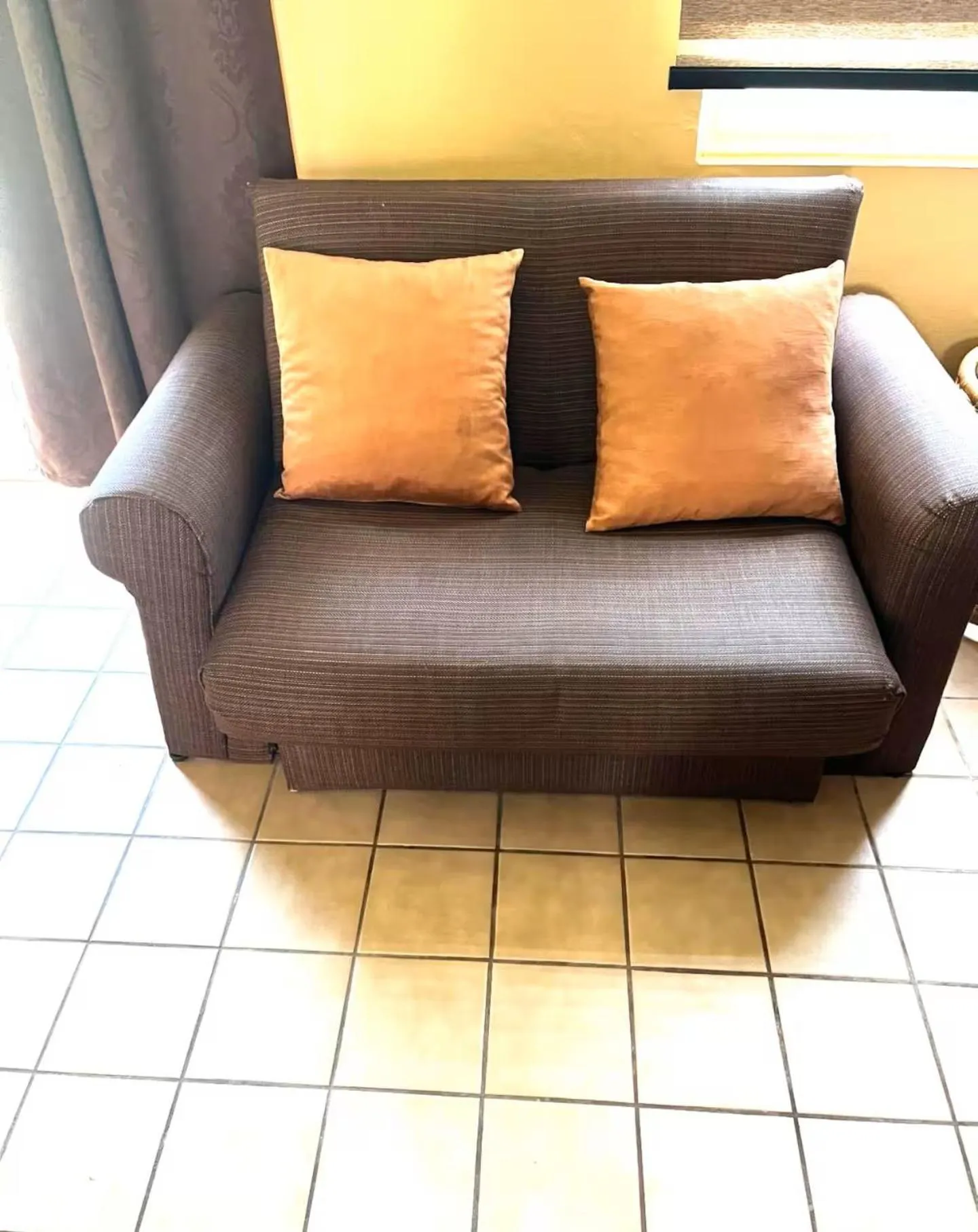 Communal lounge/ TV room in Seacastles by the beach/pool