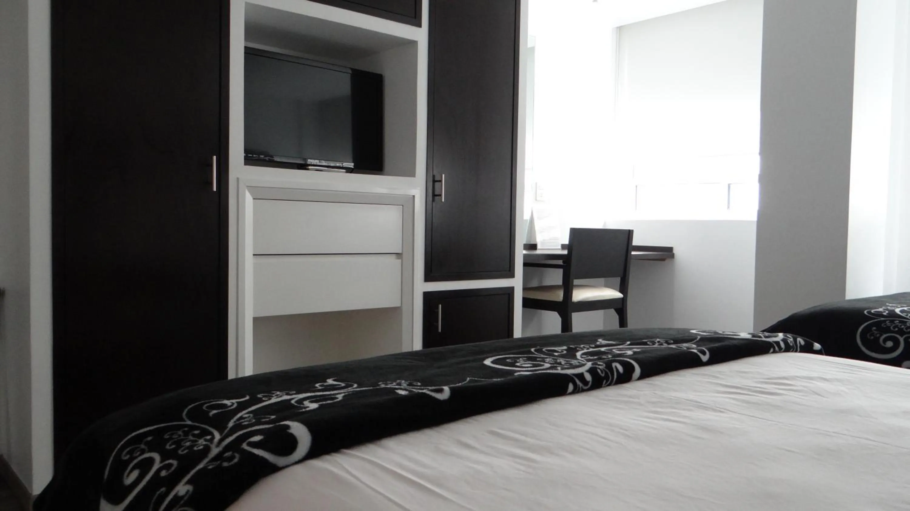 Bed in Hotel Black Boutique