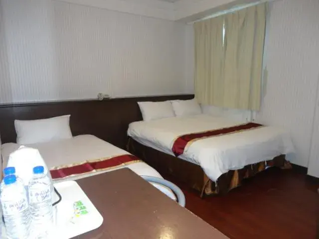 Bed in Yi Pin Yuan Hotel Bed in Yi Pin Yuan Hotel