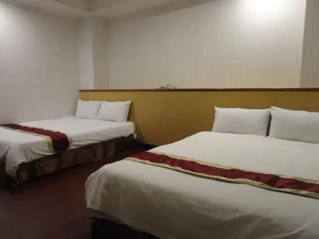 Bed in Yi Pin Yuan Hotel Bed in Yi Pin Yuan Hotel