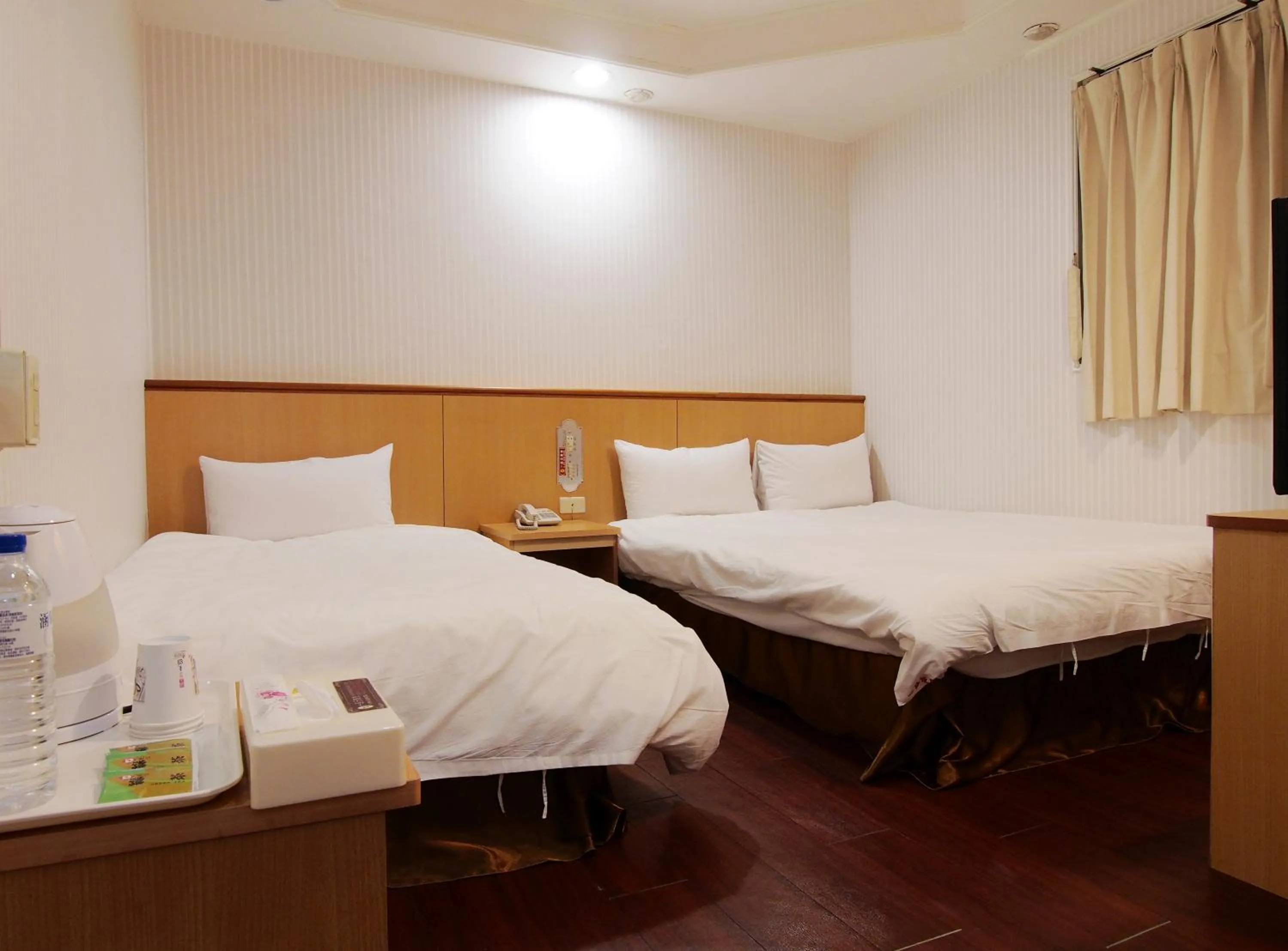 Bed in Yi Pin Yuan Hotel