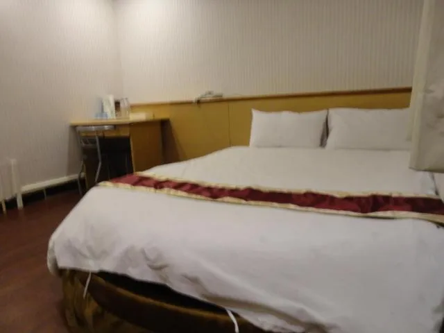 Bed in Yi Pin Yuan Hotel