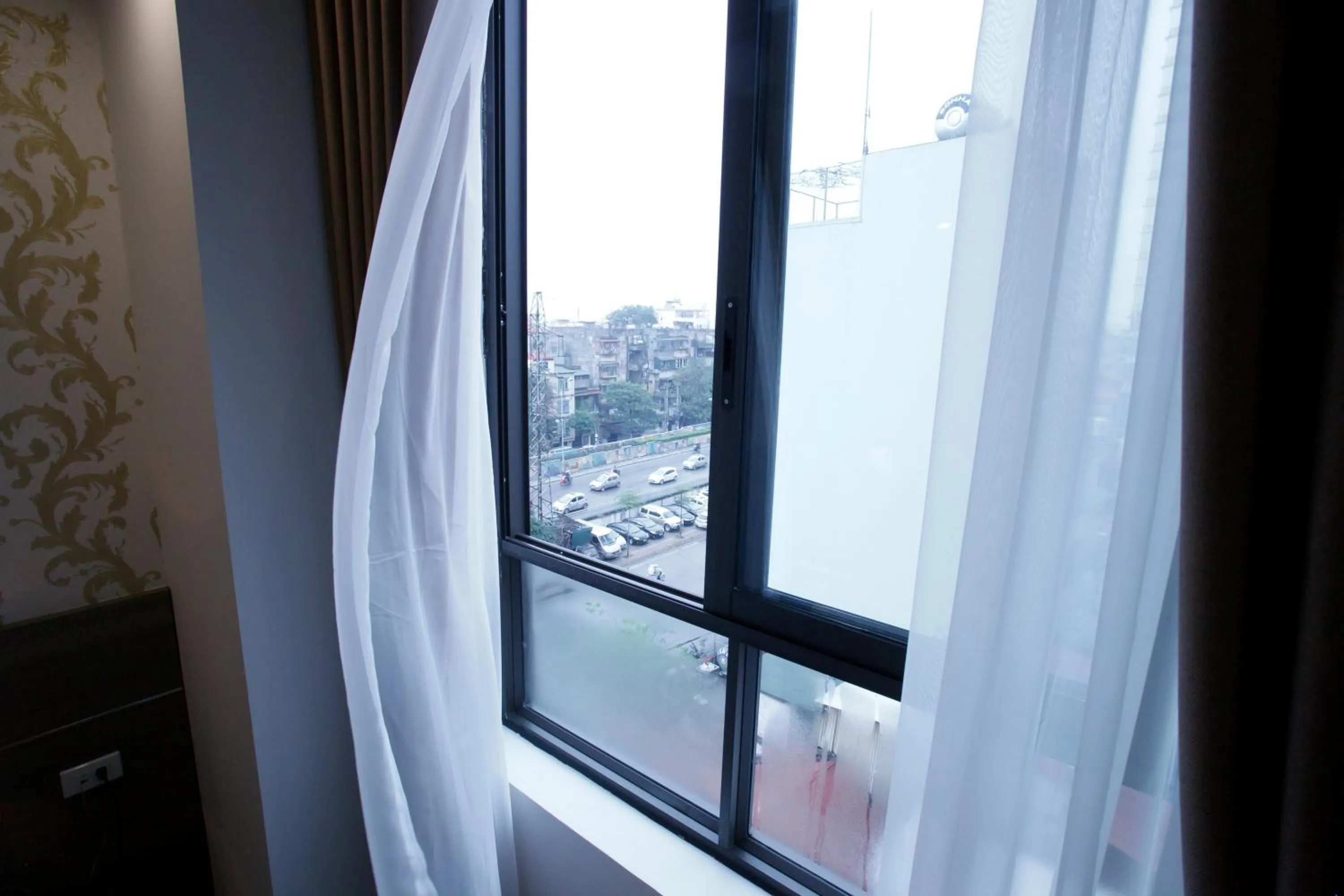 Bedroom in Hanoi Pomihoa Hotel