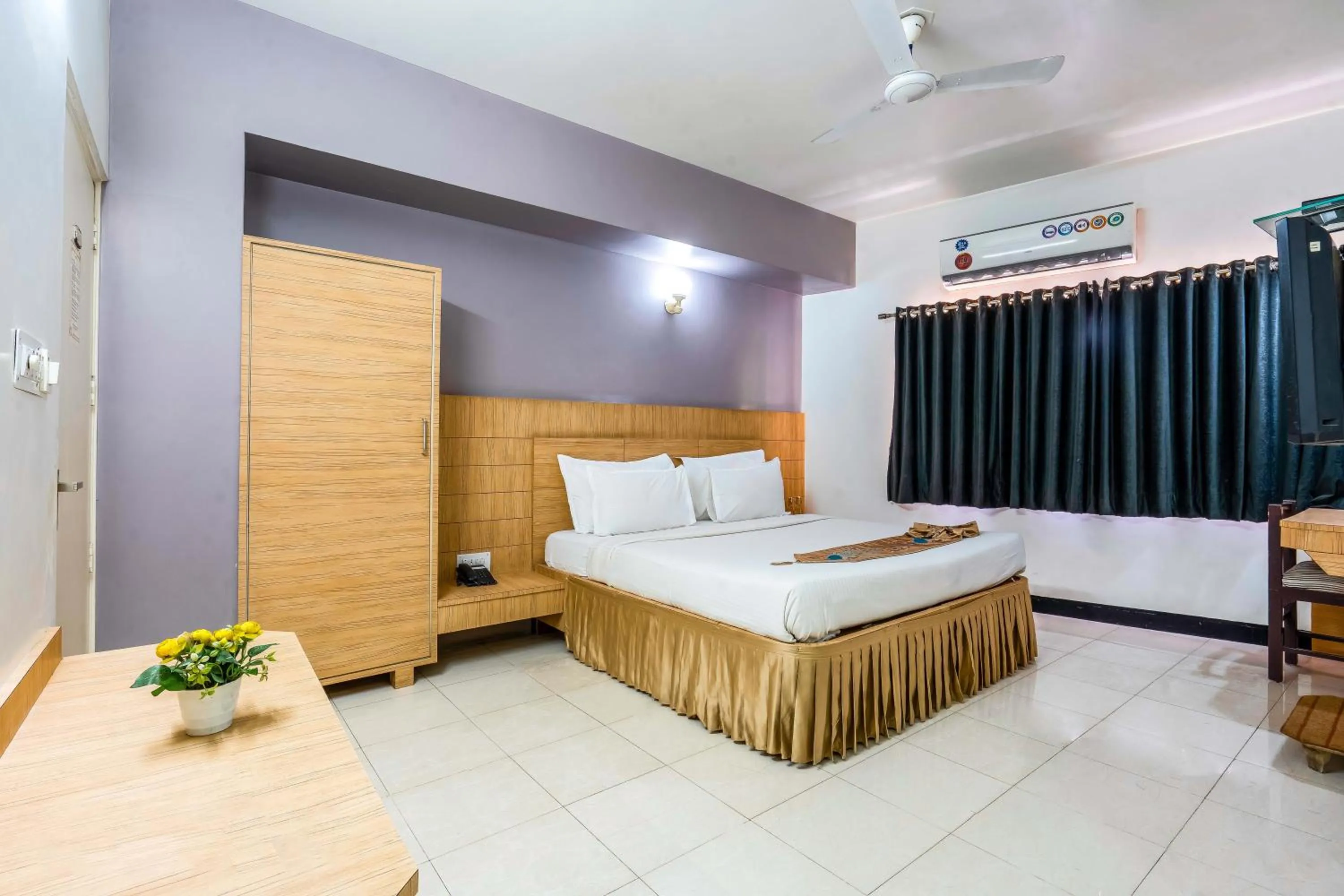 Bed in Hotel Ashish Palace