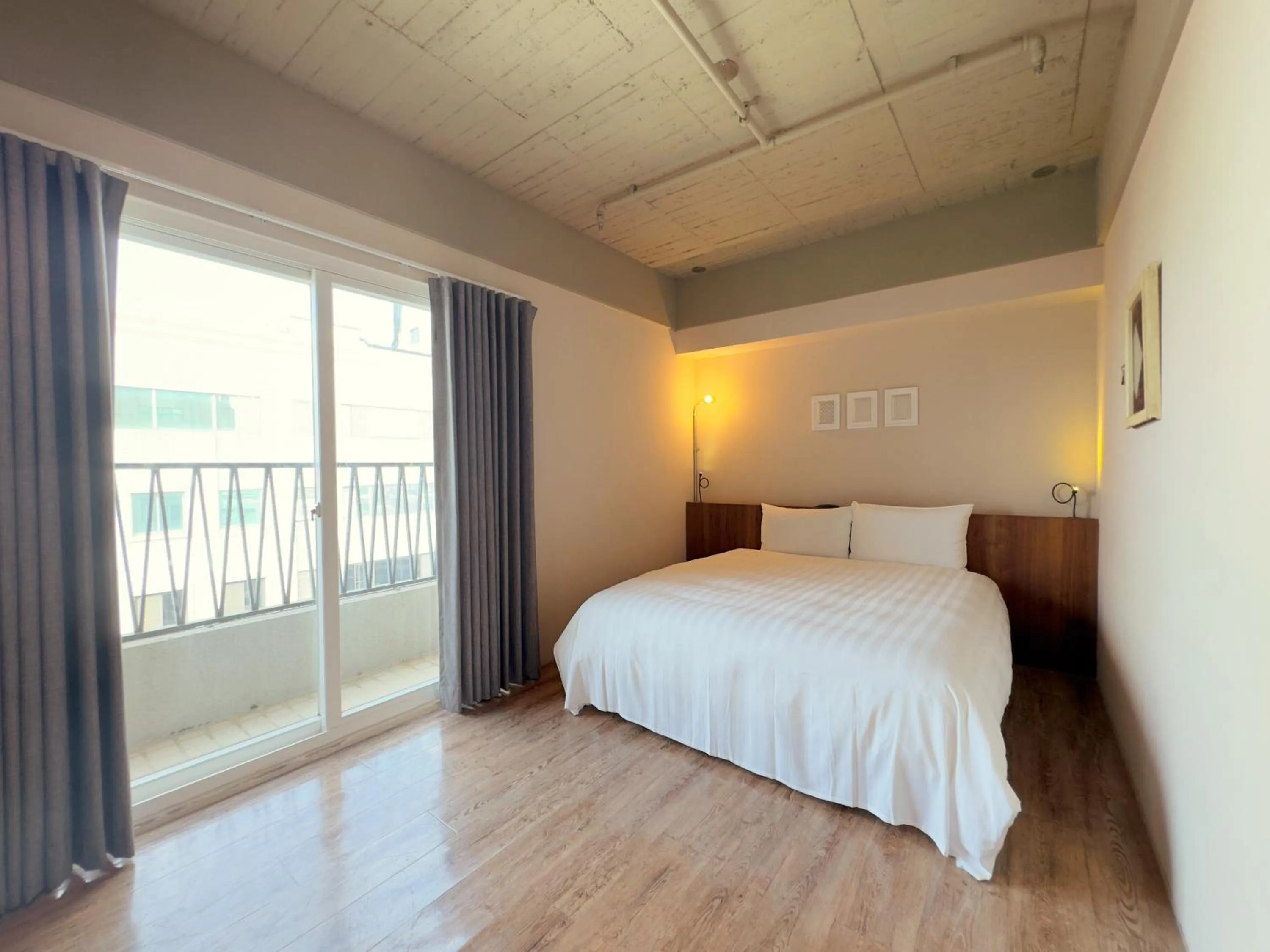 Photo of the whole room, Bed in Roaders Hotel Tainan ChengDa