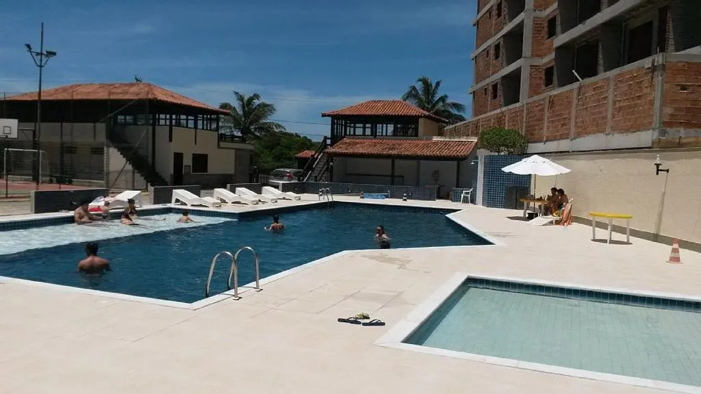 Swimming pool in Casa 4 quartos Condomínio em Frente a Praia Grande