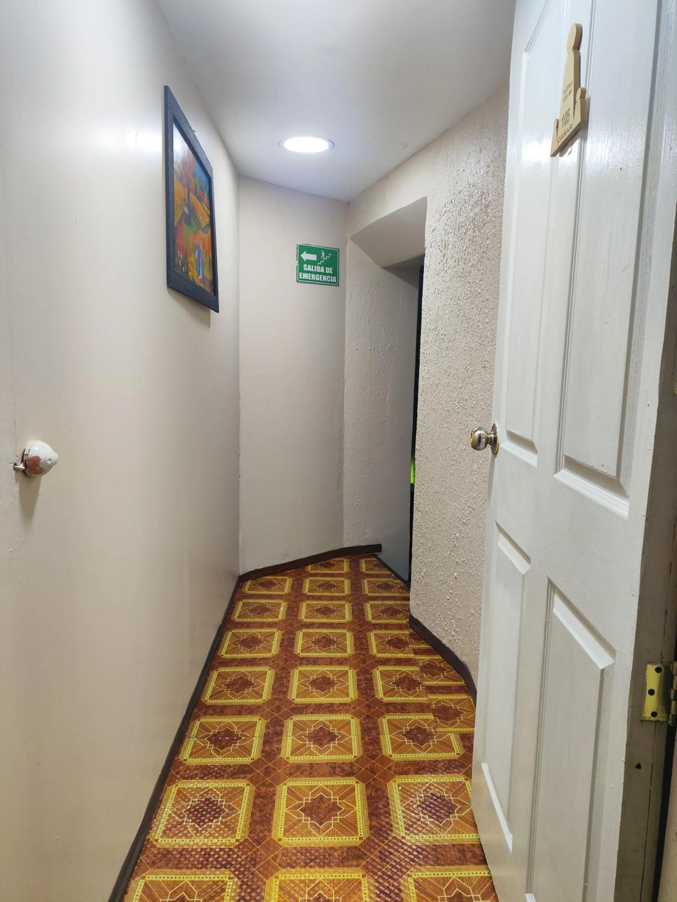 Quadruple Room with Balcony - single occupancy in Hostal Latitud Ecuem