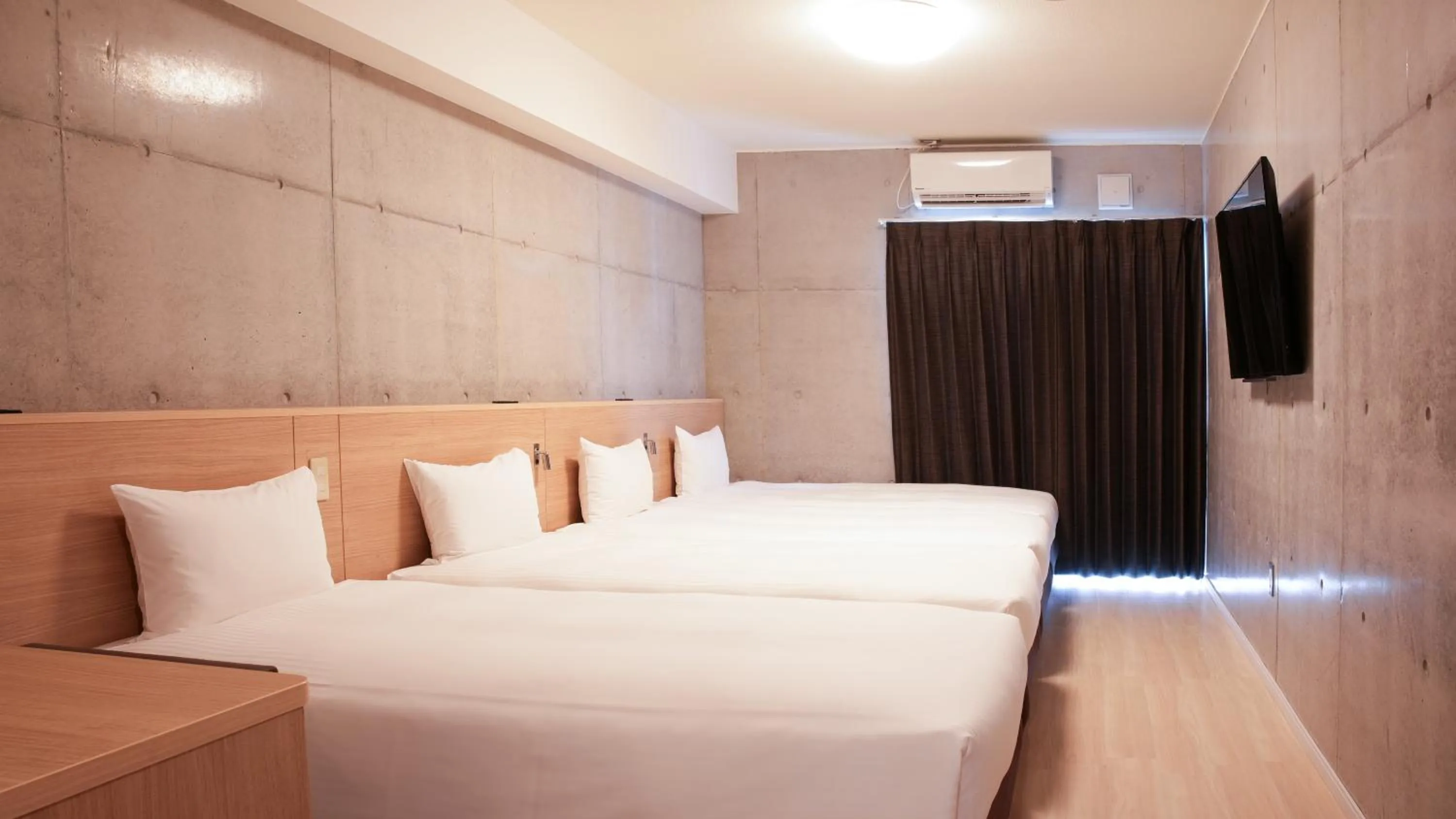 Bed in The BREAKFAST HOTEL PORTO Ishigakijima