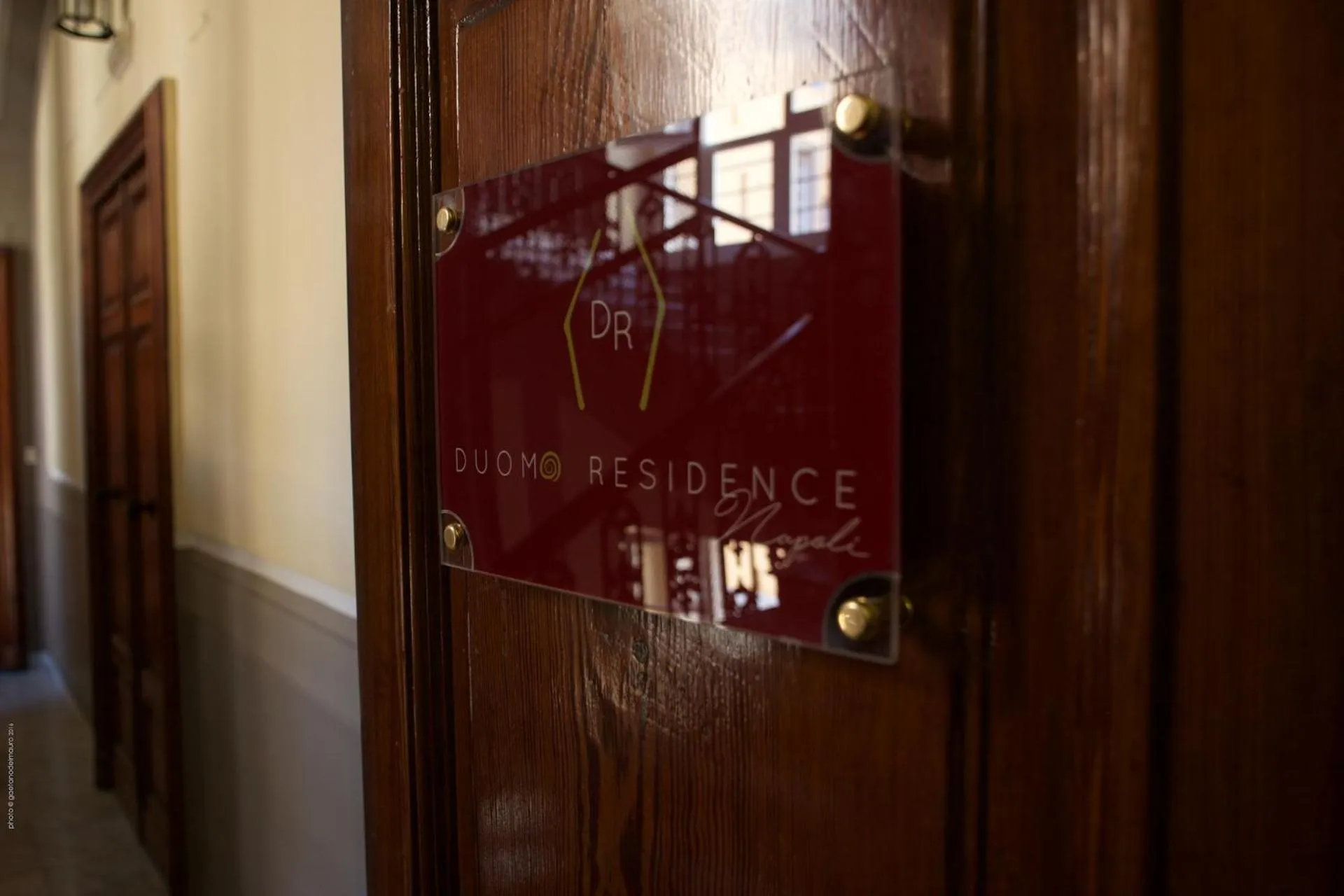 Property logo or sign in Duomo Residence