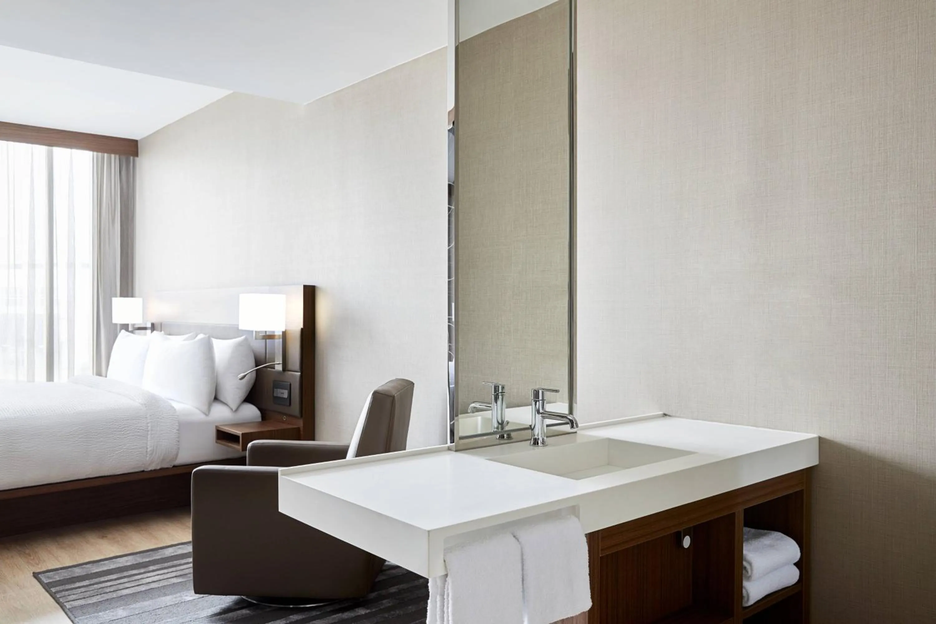 Photo of the whole room, Bed in AC Hotel by Marriott Raleigh North Hills