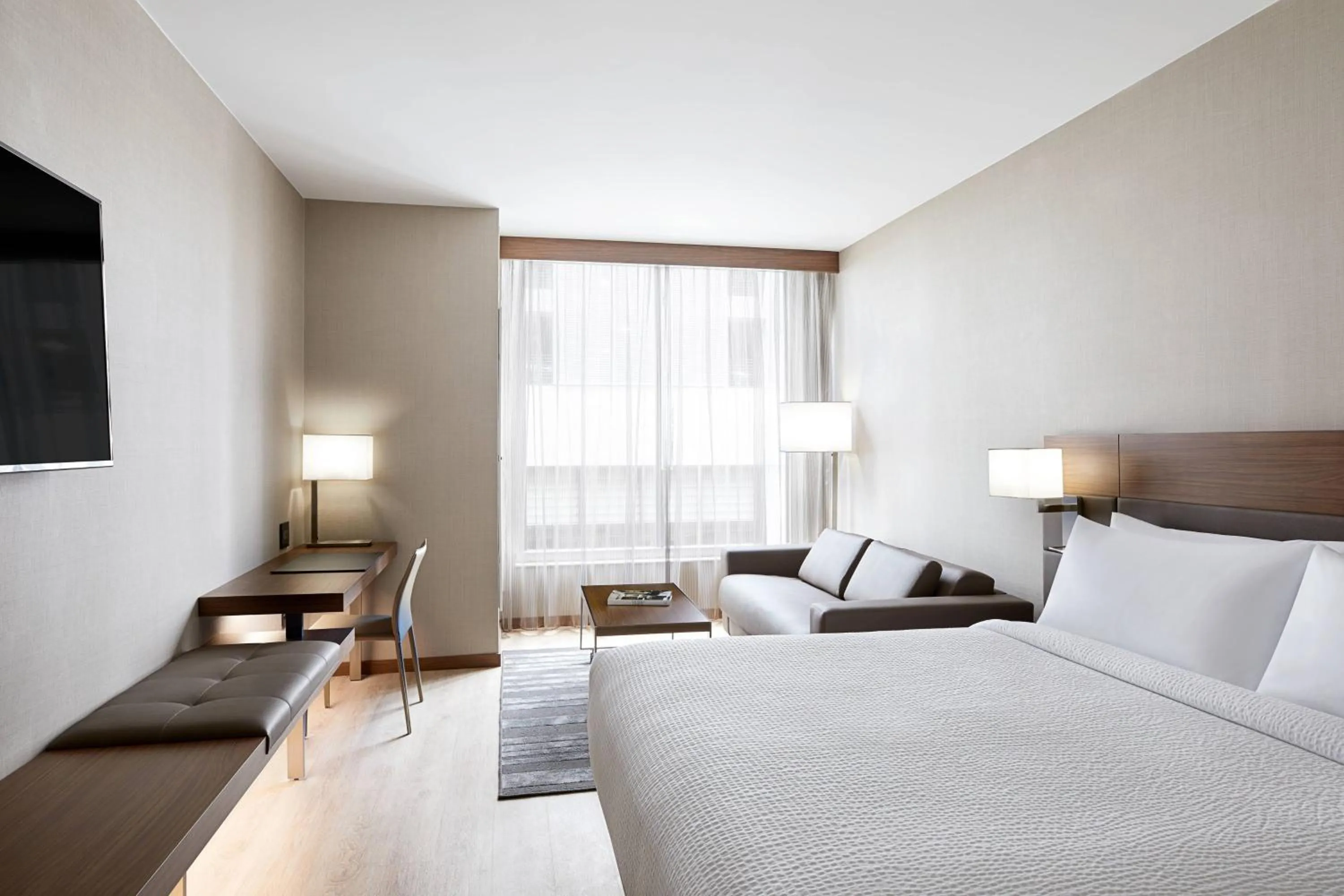 Photo of the whole room, Bed in AC Hotel by Marriott Raleigh North Hills