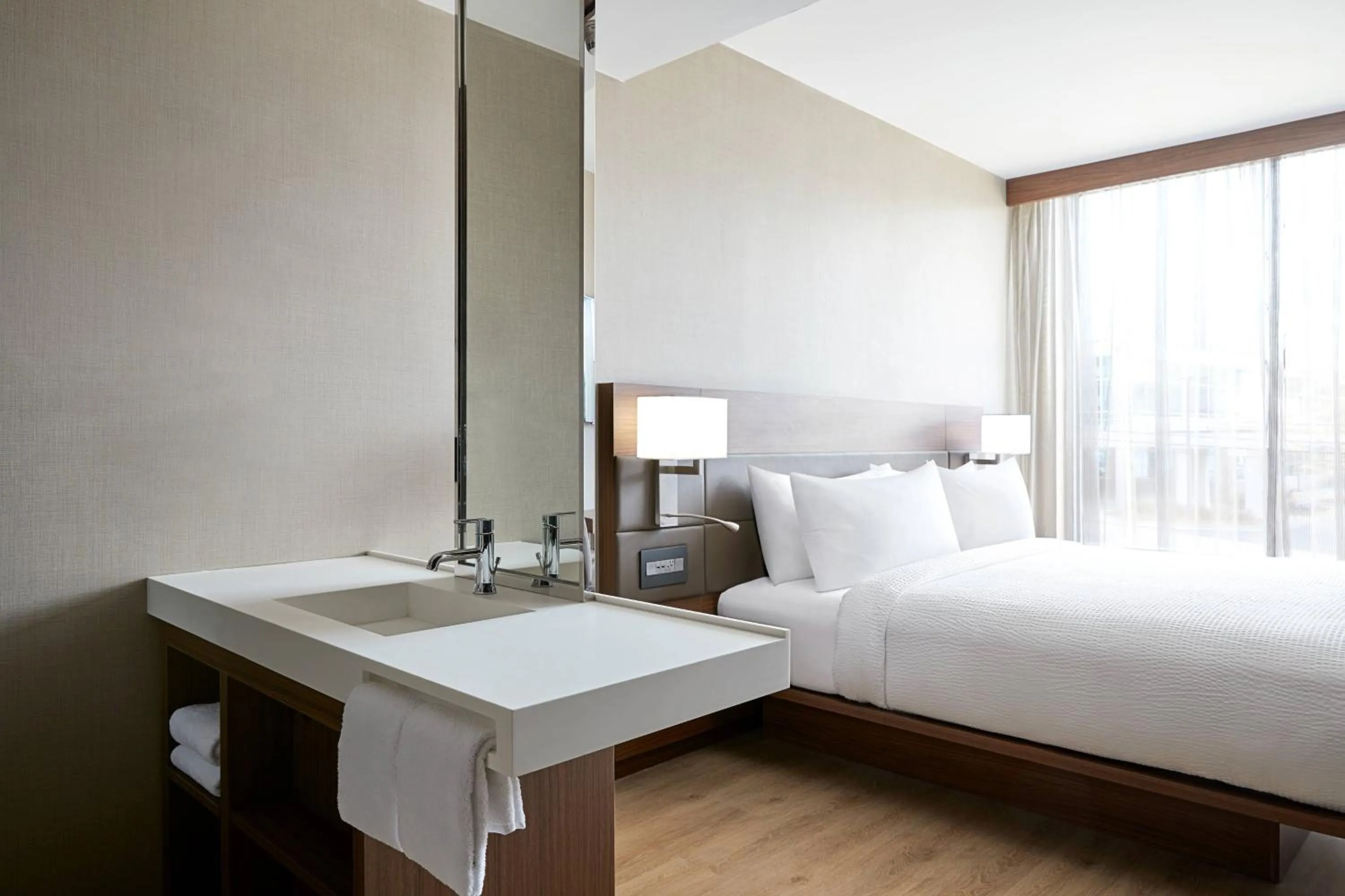 Photo of the whole room, Bed in AC Hotel by Marriott Raleigh North Hills