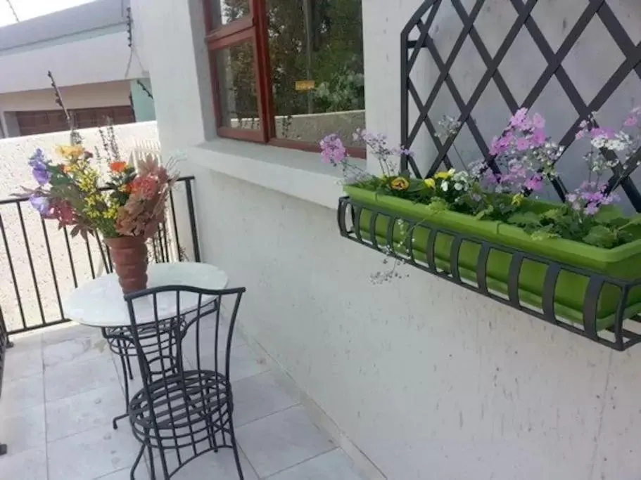 Patio in Spacious Garden Cottage