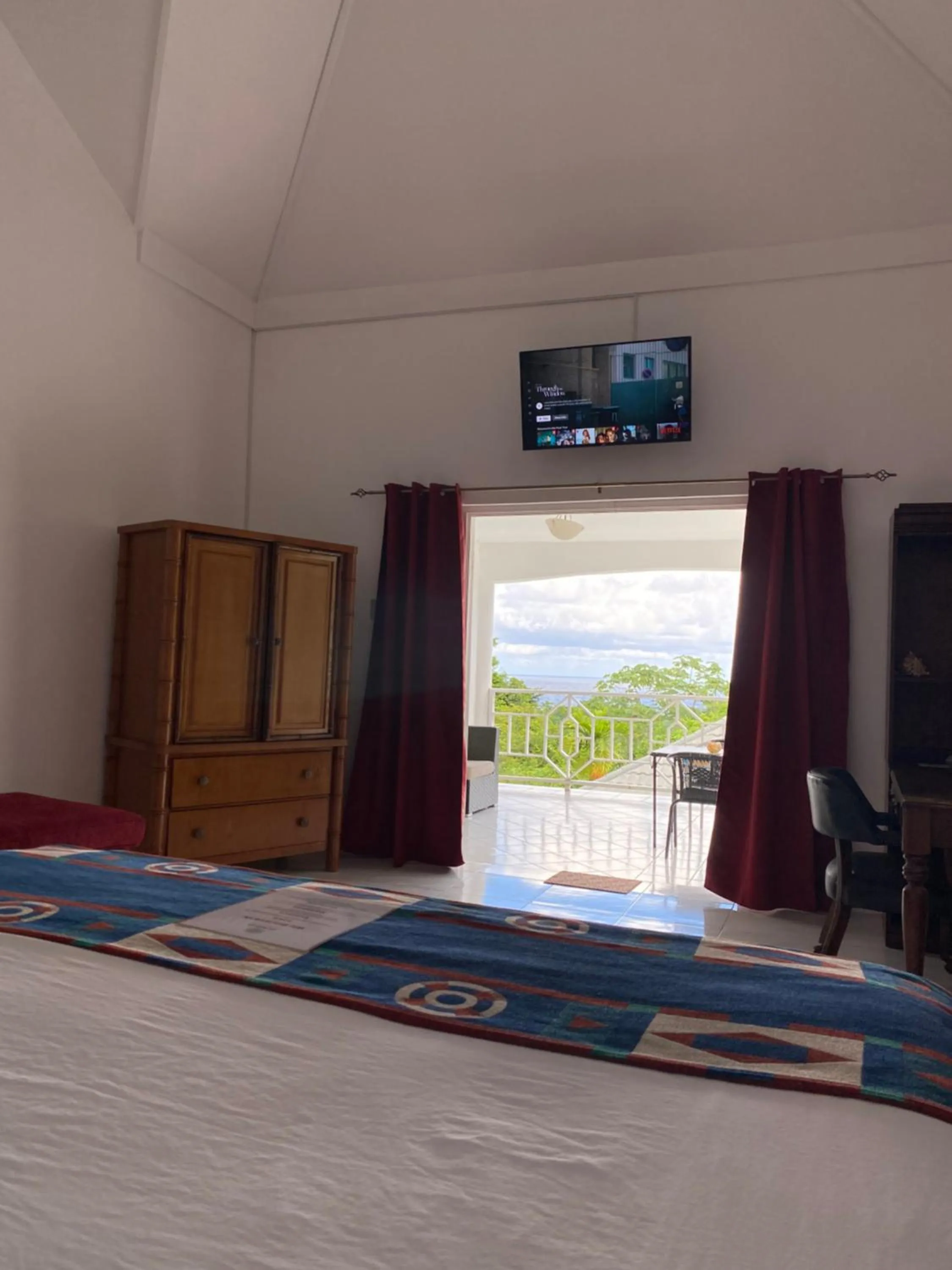 Seating area, Bed in All Nations Guest House