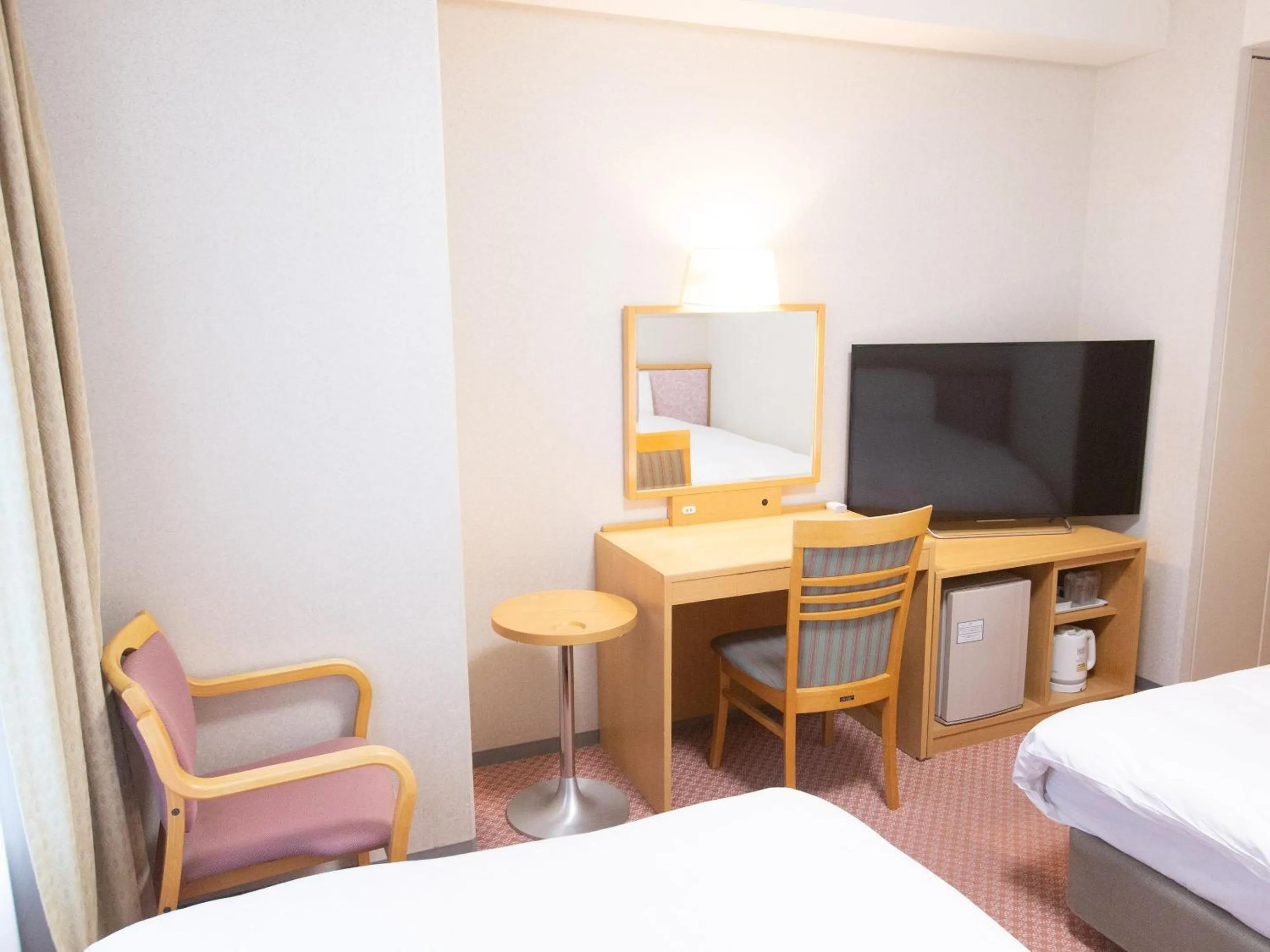 Photo of the whole room, Bed in Toyama Chitetsu Hotel