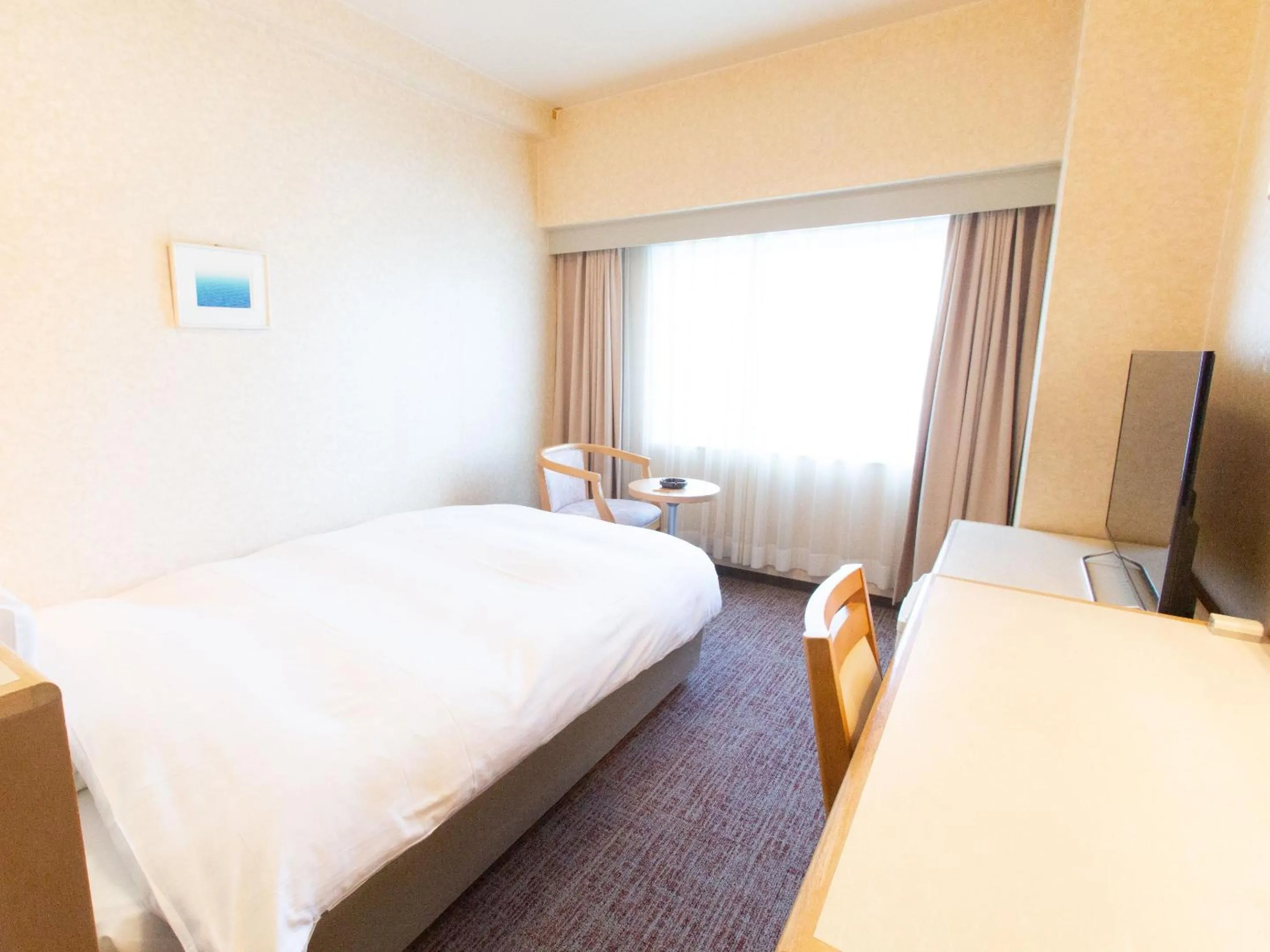 Photo of the whole room, Bed in Toyama Chitetsu Hotel