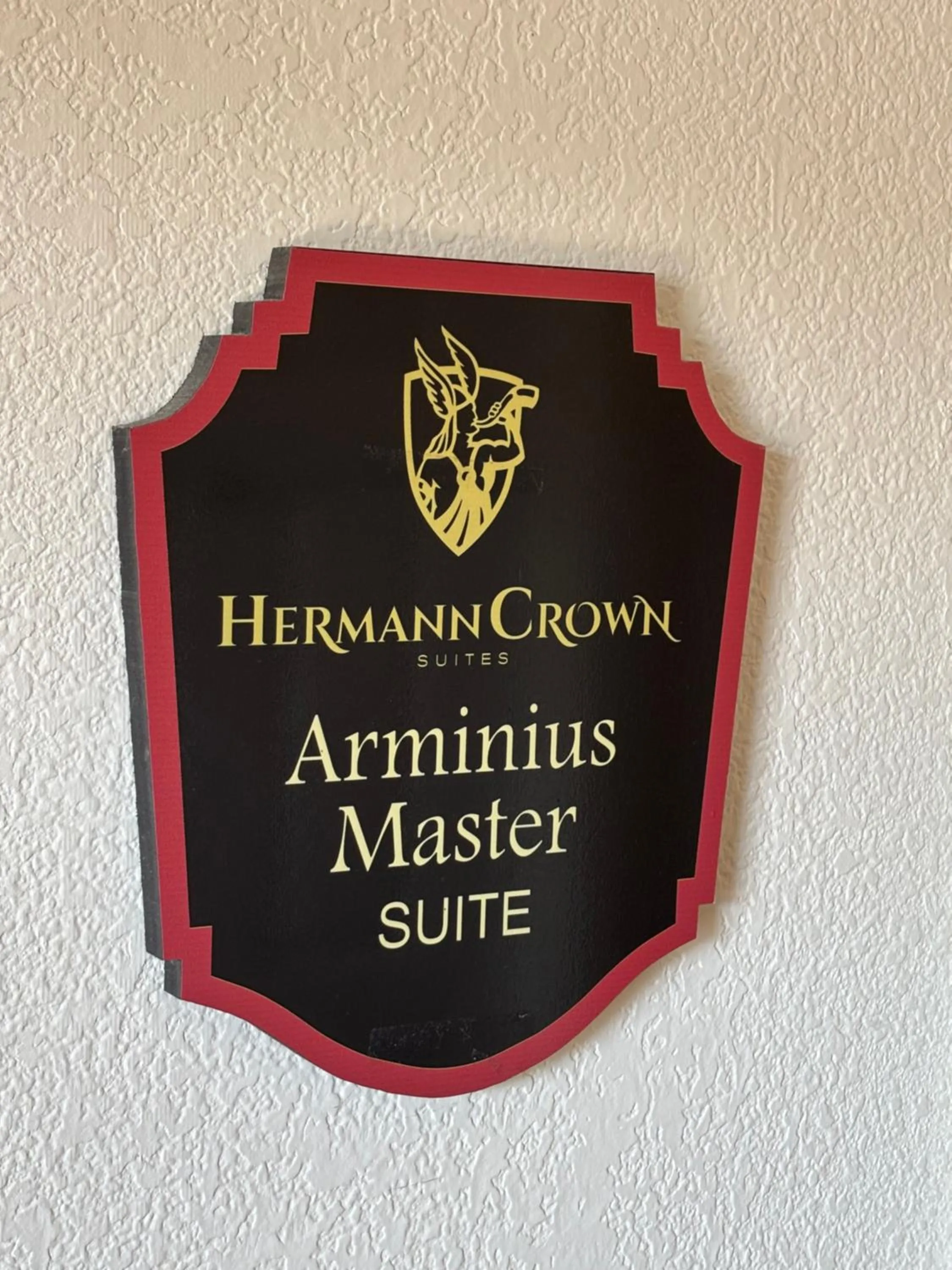 Property logo or sign in Hermann Crown Suites